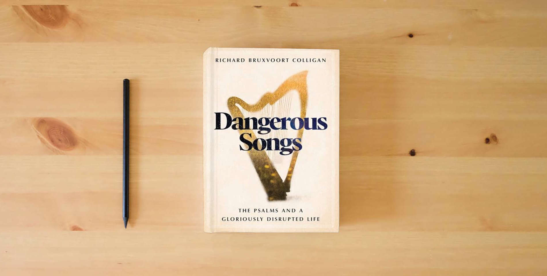 The book Dangerous Songs: The Psalms and a Gloriously Disrupted Life is on the table