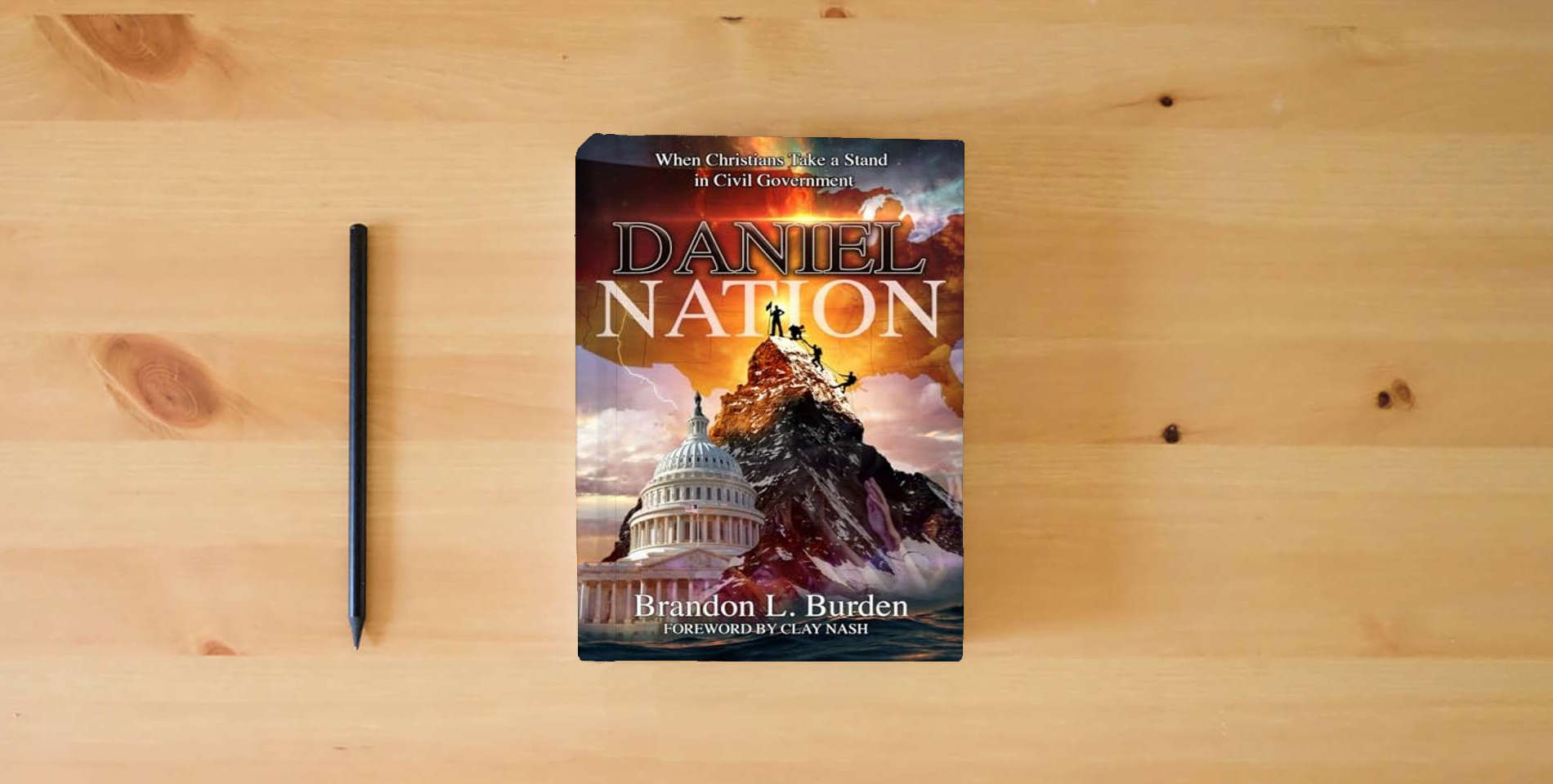 The book Daniel Nation: When Christians Take a Stand in Civil Government is on the table