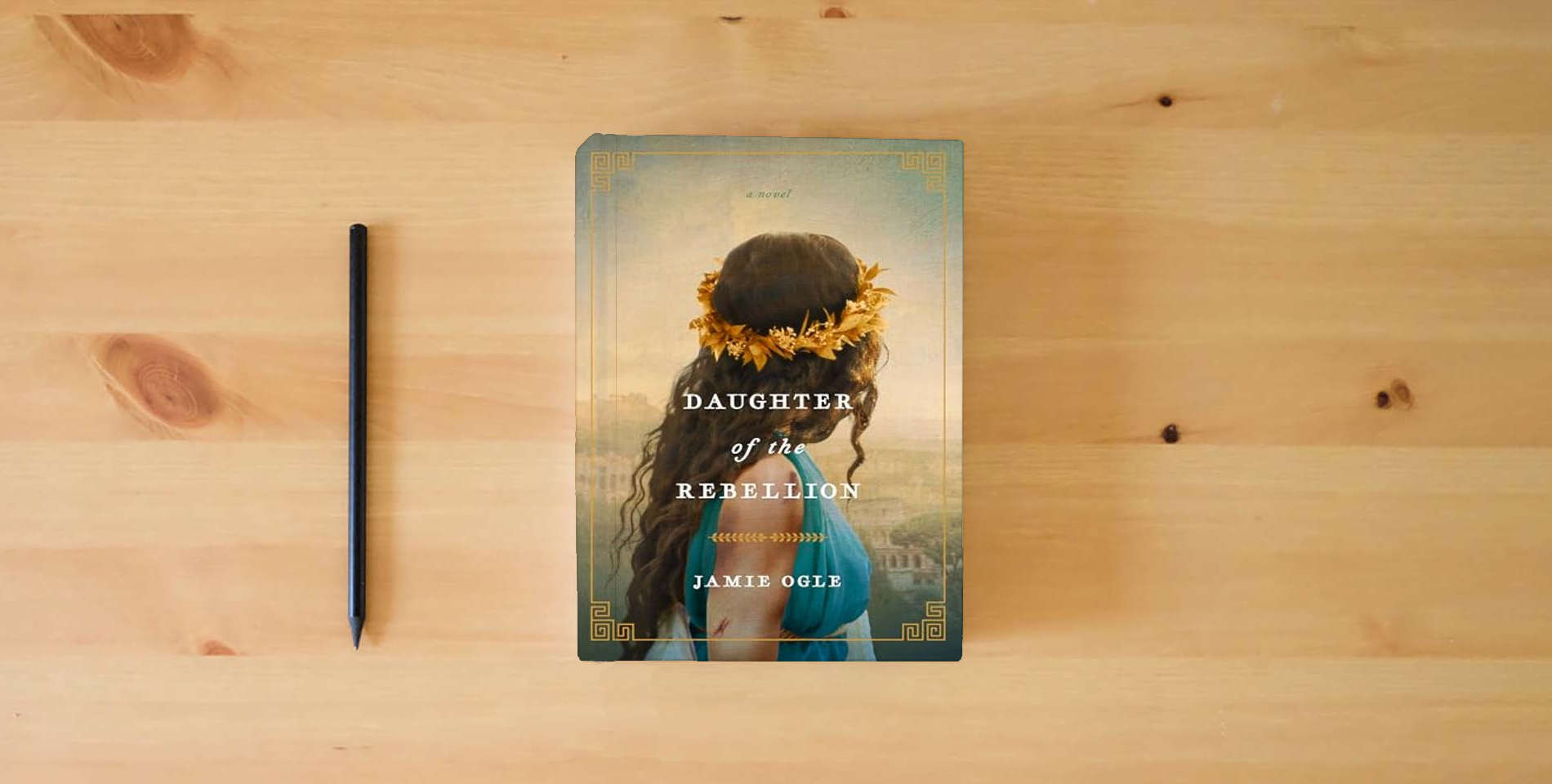 The book Daughter of the Rebellion is on the table