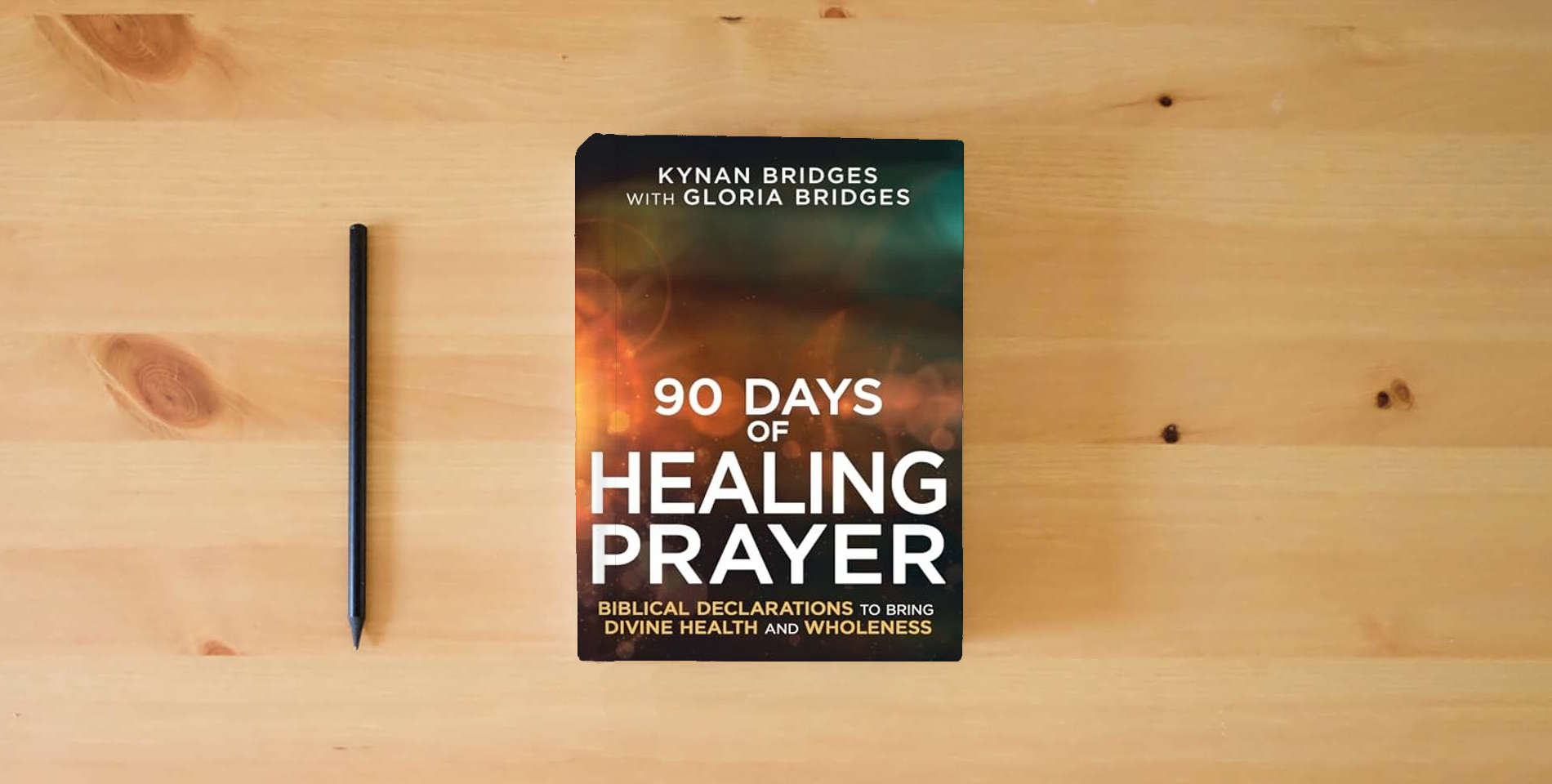 The book 90 Days of Healing Prayer: Biblical Declarations to Bring Divine Health and Wholeness is on the table
