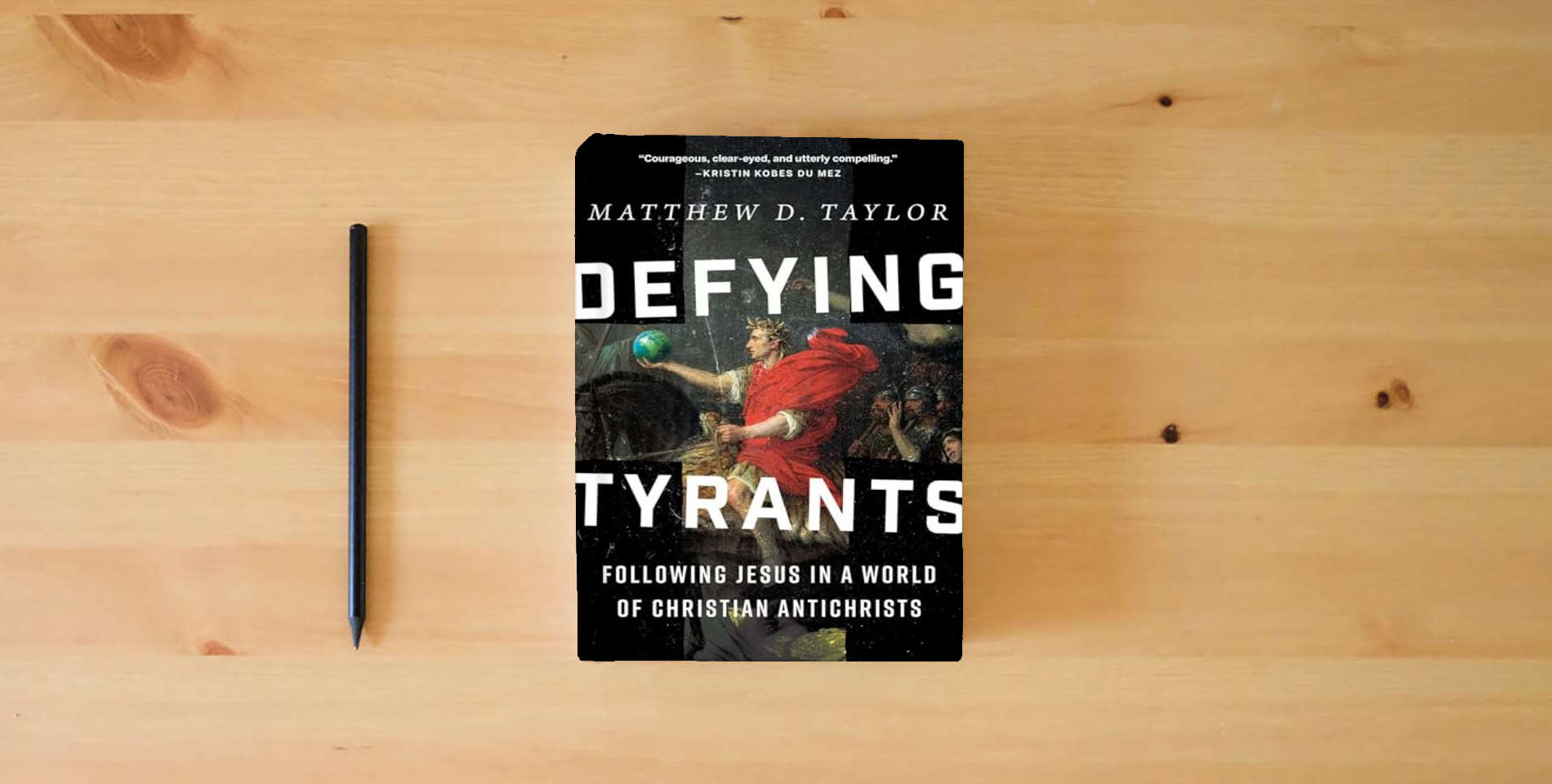 The book Defying Tyrants: Following Jesus in a World of Christian Antichrists is on the table