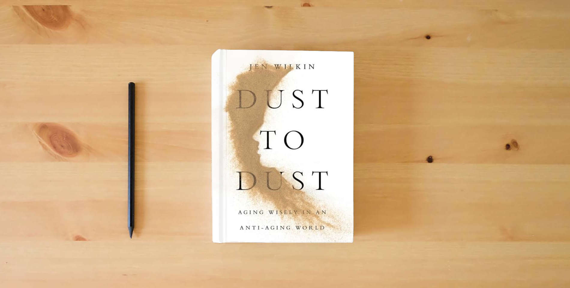 The book Dust to Dust: Aging Wisely in an Anti-Aging World is on the table