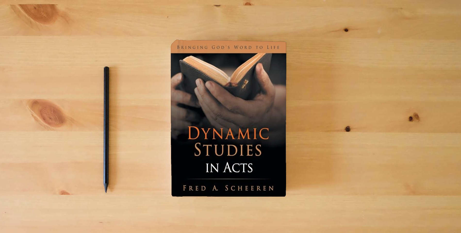 The book Dynamic Studies in Acts: Bringing God's Word to Life is on the table