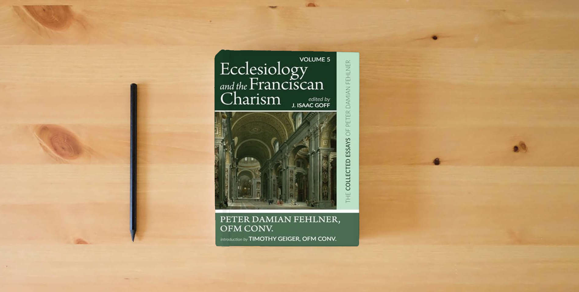 The book Ecclesiology and the Franciscan Charism: The Collected Essays of Peter Damian Fehlner, OFM Conv: Volume 5 is on the table