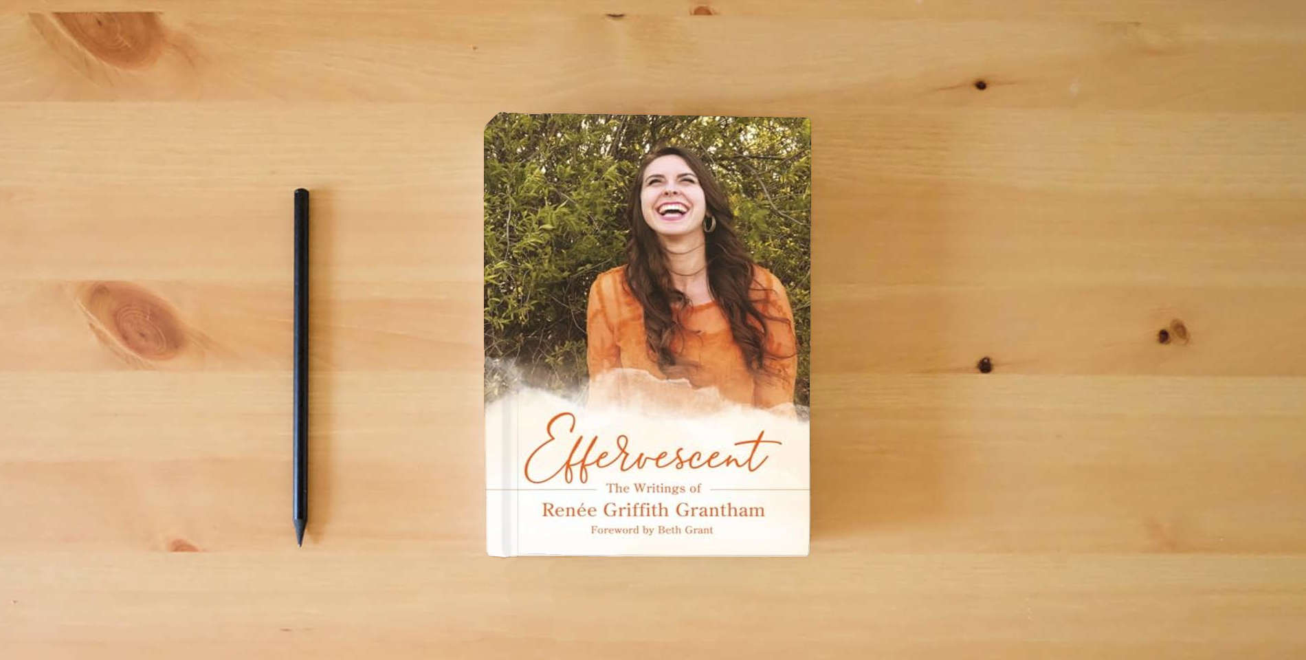 The book Effervescent: The Writings of Renée Griffith Grantham is on the table