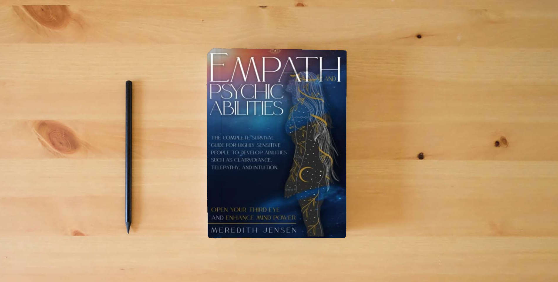 The book Empath and Psychic Abilities: The Complete Survival Guide for Highly Sensitive People to Develop Abilities Such As Clairvoyance, Telepathy, and Intuition. Open Your Third Eye and Enhance Mind Power is on the table