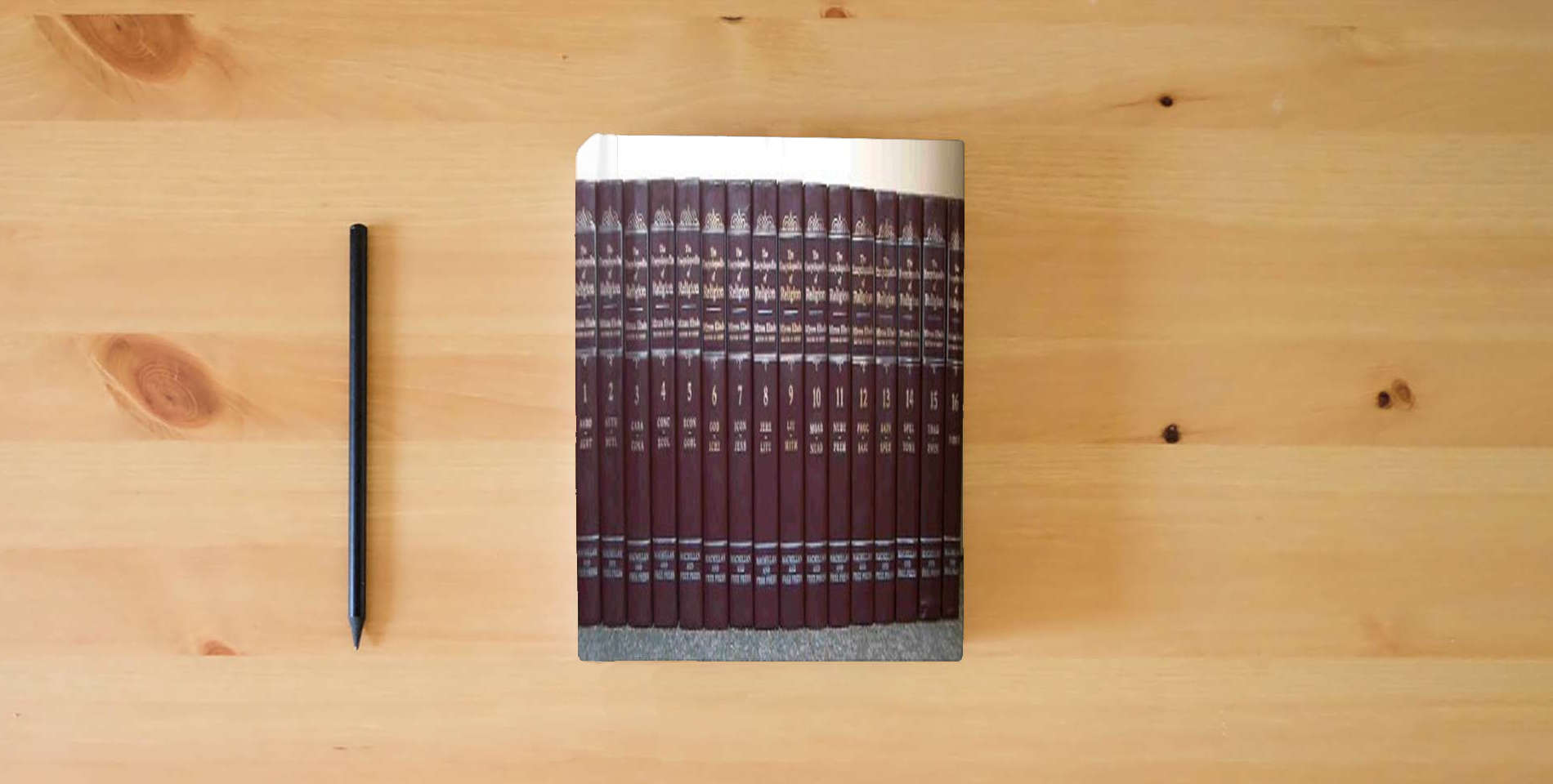 The book Encyclopedia of Religion: 16 Volume Set is on the table