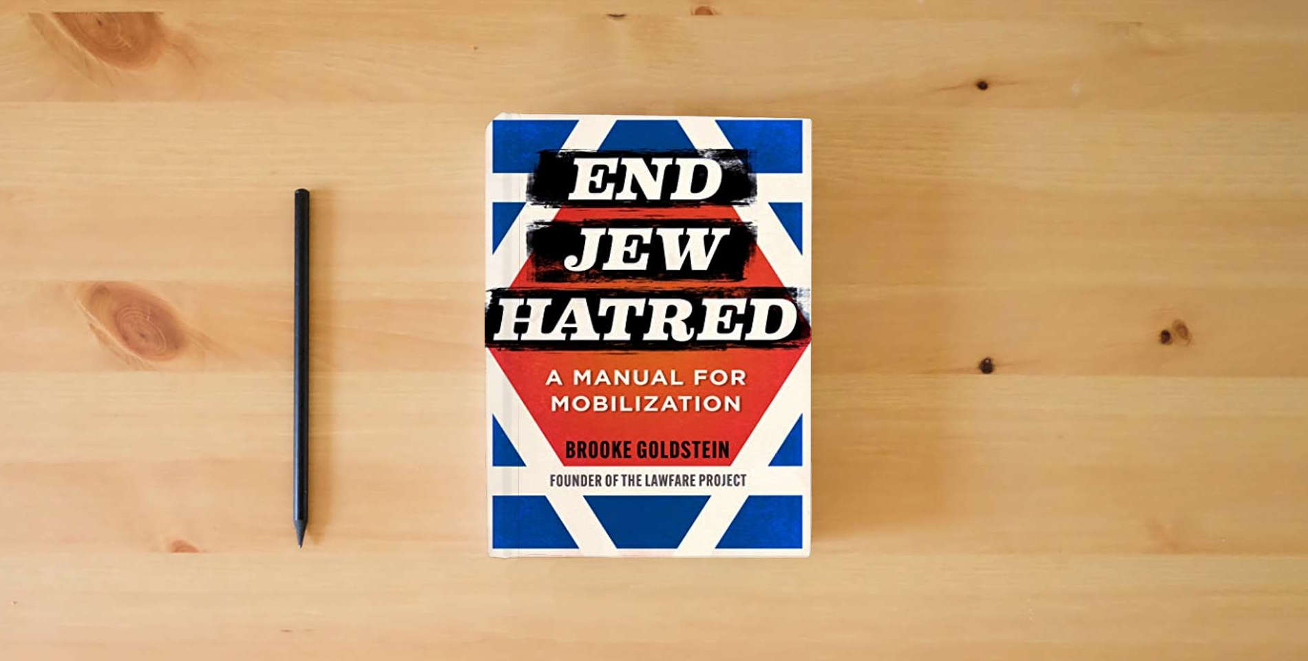 The book End Jew Hatred: A Manual for Mobilization is on the table