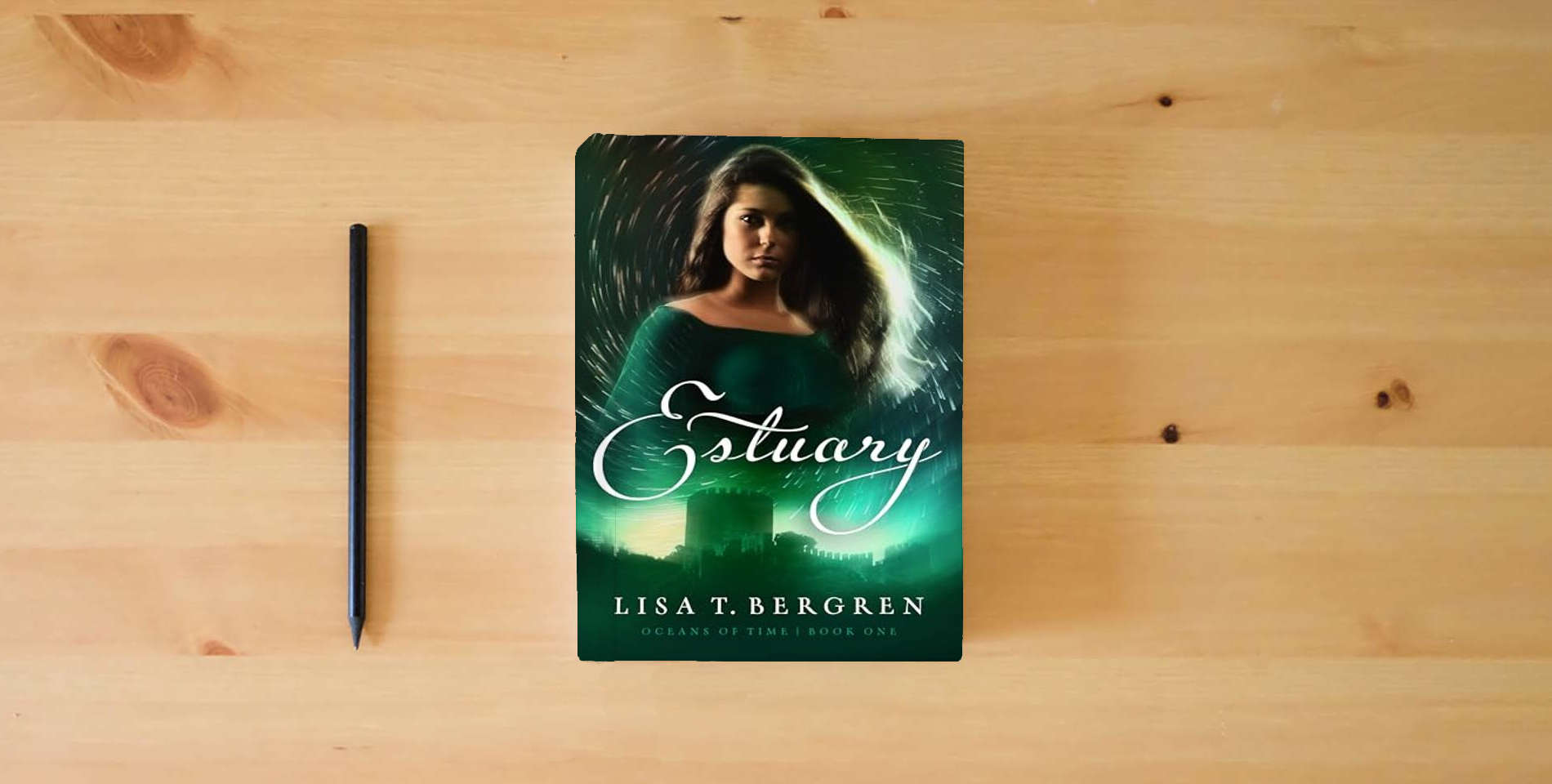 The book Estuary (Volume 1) (Oceans of Time) is on the table