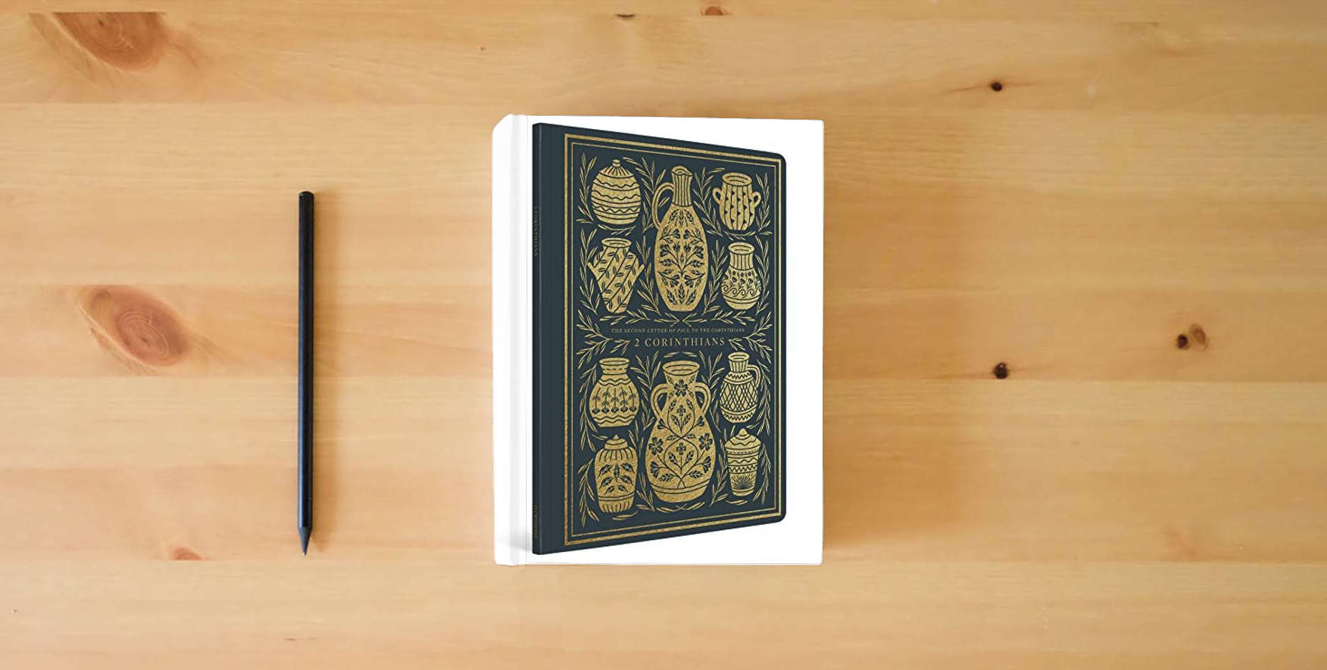 The book ESV Illuminated Scripture Journal: 2 Corinthians is on the table
