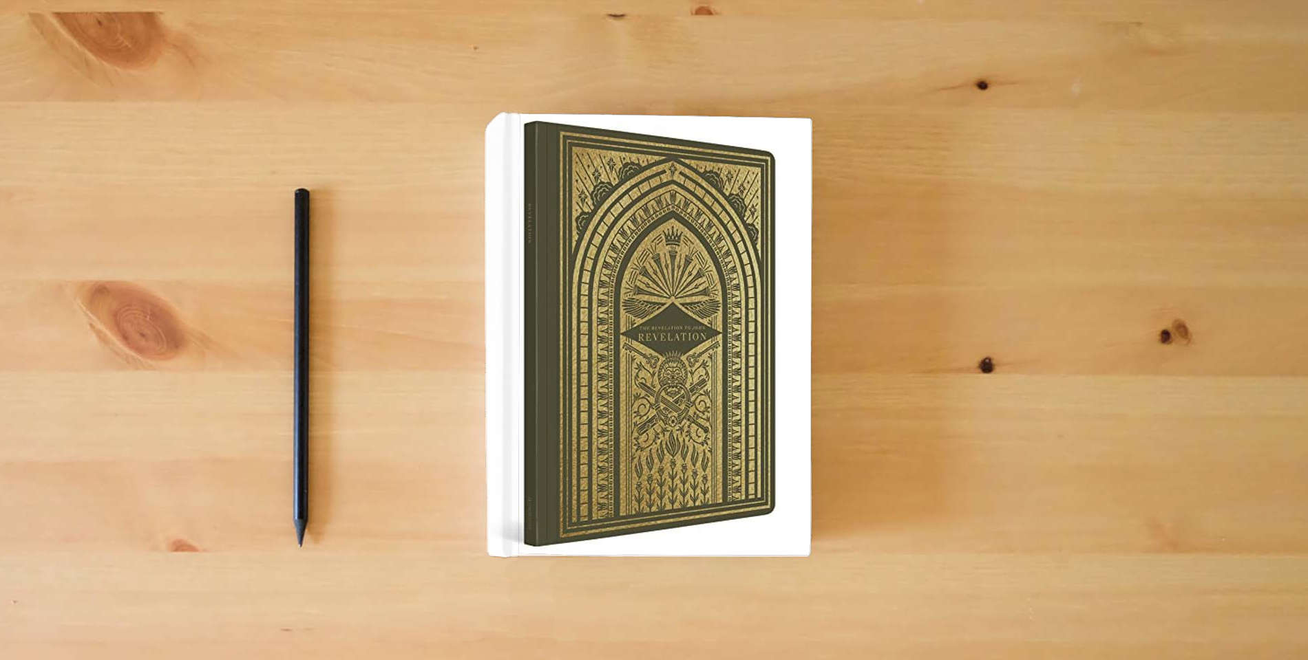 The book ESV Illuminated Scripture Journal: Revelation is on the table