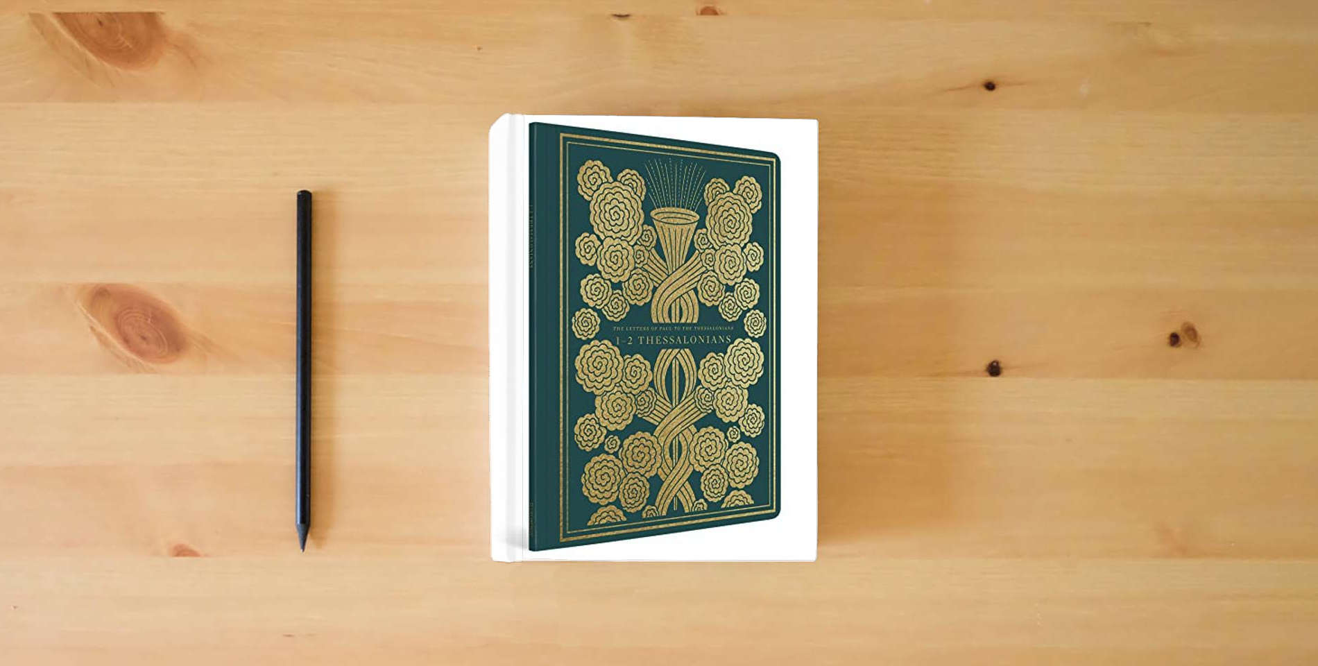 The book ESV Illuminated Scripture Journal: 1–2 Thessalonians (Paperback) is on the table