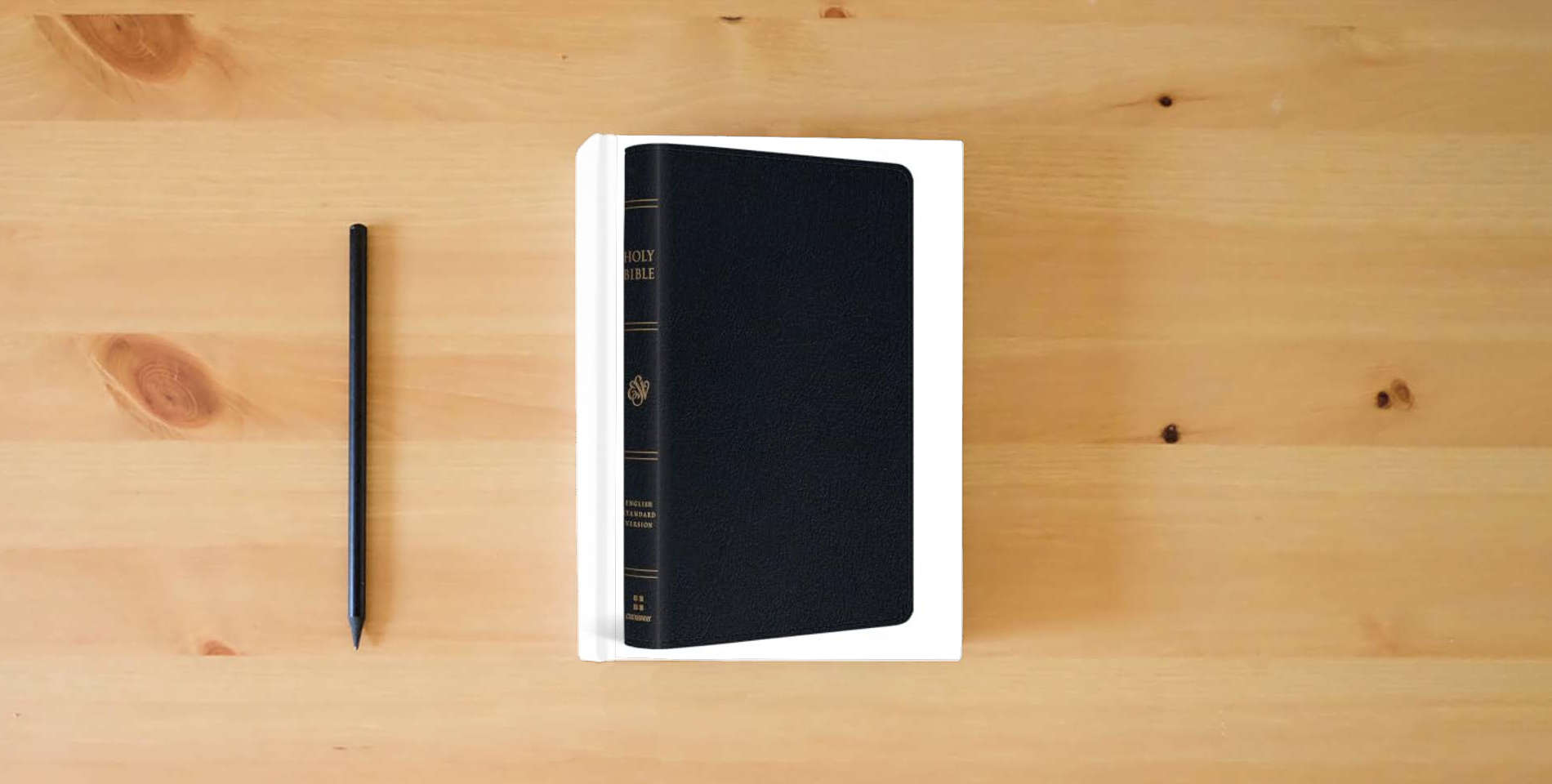 The book ESV Large Print Thinline Reference Bible, Red Letter (Genuine Leather, Black): Holy Bible, English Standard Version is on the table