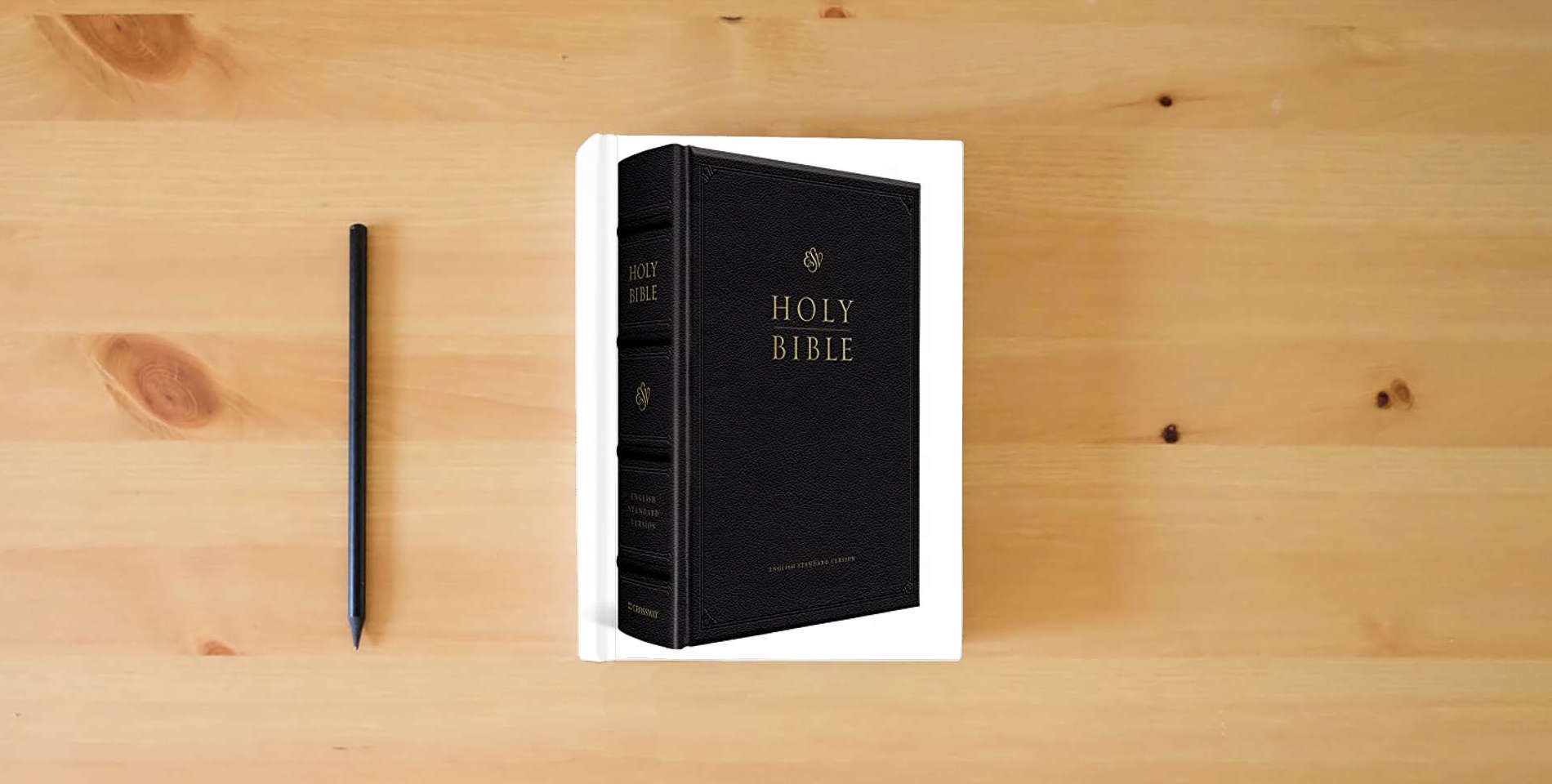 The book ESV Pulpit Bible (Cowhide over Board, Black) is on the table