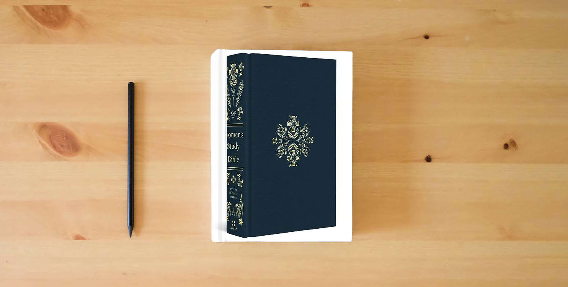 The book ESV Women's Study Bible (Cloth over Board, Dark Teal): Holy Bible, English Standard Version is on the table