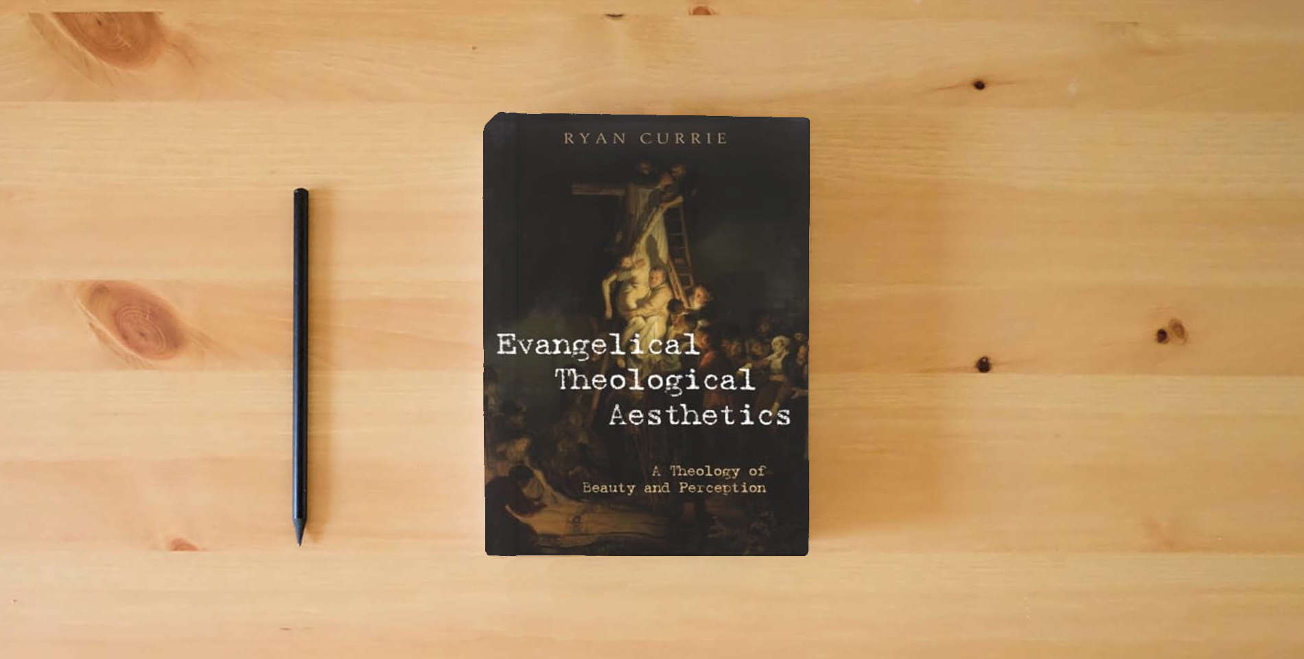 The book Evangelical Theological Aesthetics: A Theology of Beauty and Perception is on the table