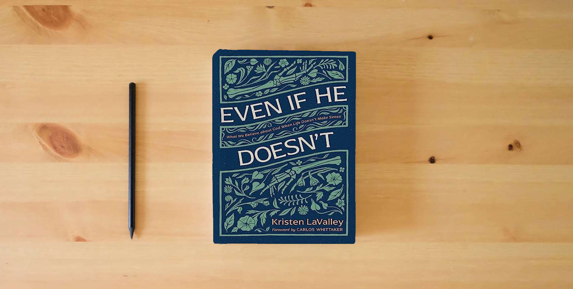The book Even If He Doesn't: What We Believe about God When Life Doesn’t Make Sense is on the table