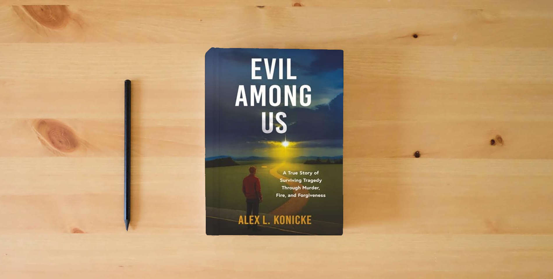The book Evil Among Us: A True Story of Surviving Tragedy Through Murder, Fire, and Forgiveness is on the table
