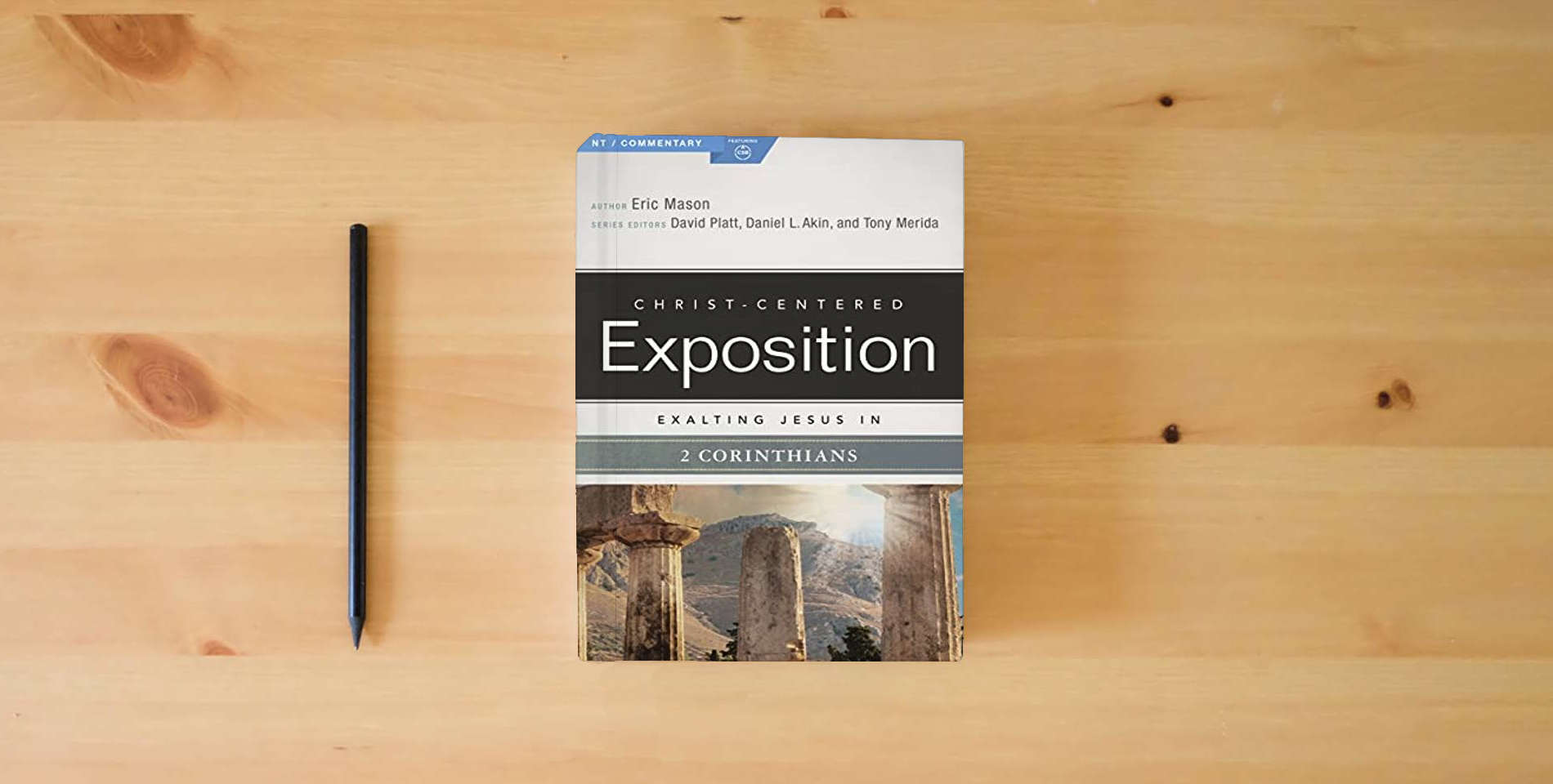 The book Exalting Jesus in 2 Corinthians (Christ-Centered Exposition Commentary) is on the table