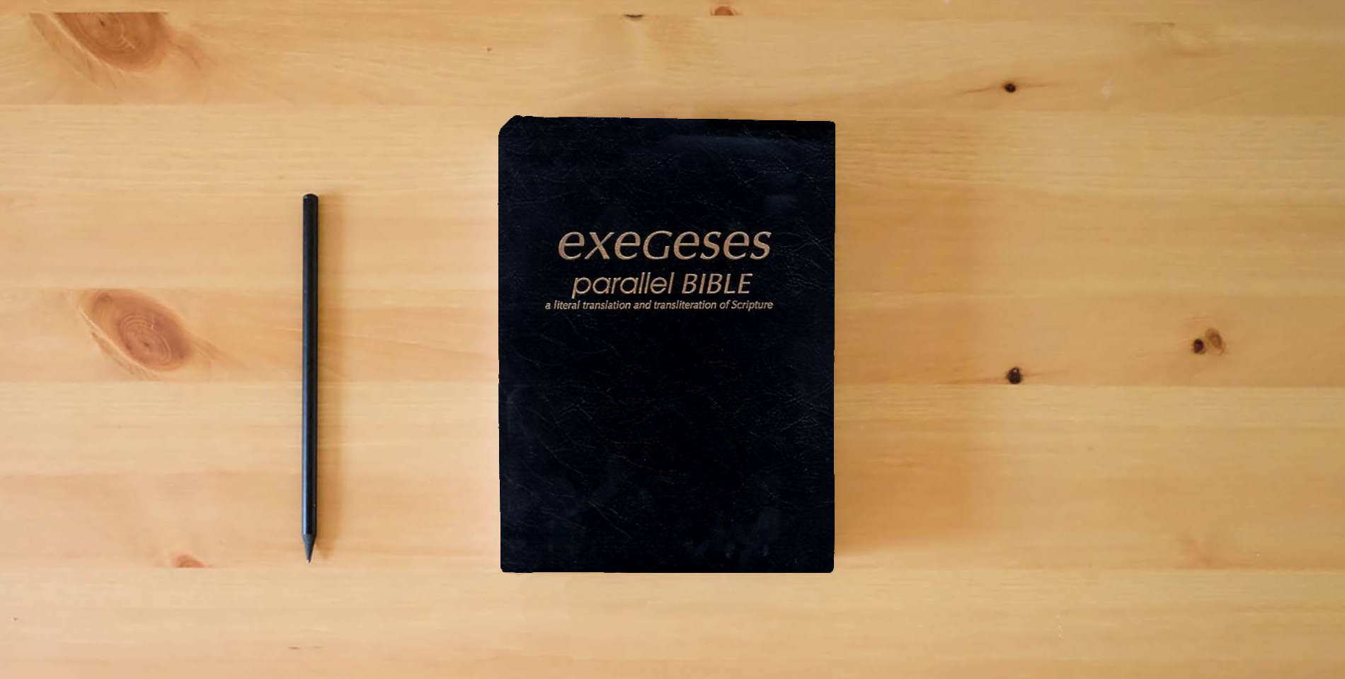 The book Exegeses Parallel Bible is on the table