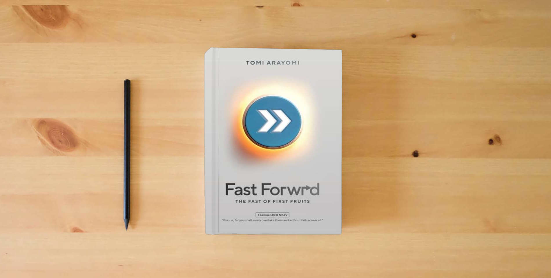 The book Fast Forwrd: The Fast of First Fruits is on the table