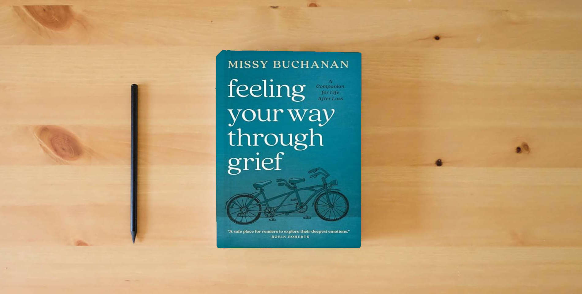 The book Feeling Your Way Through Grief: A Companion for Life after Loss is on the table