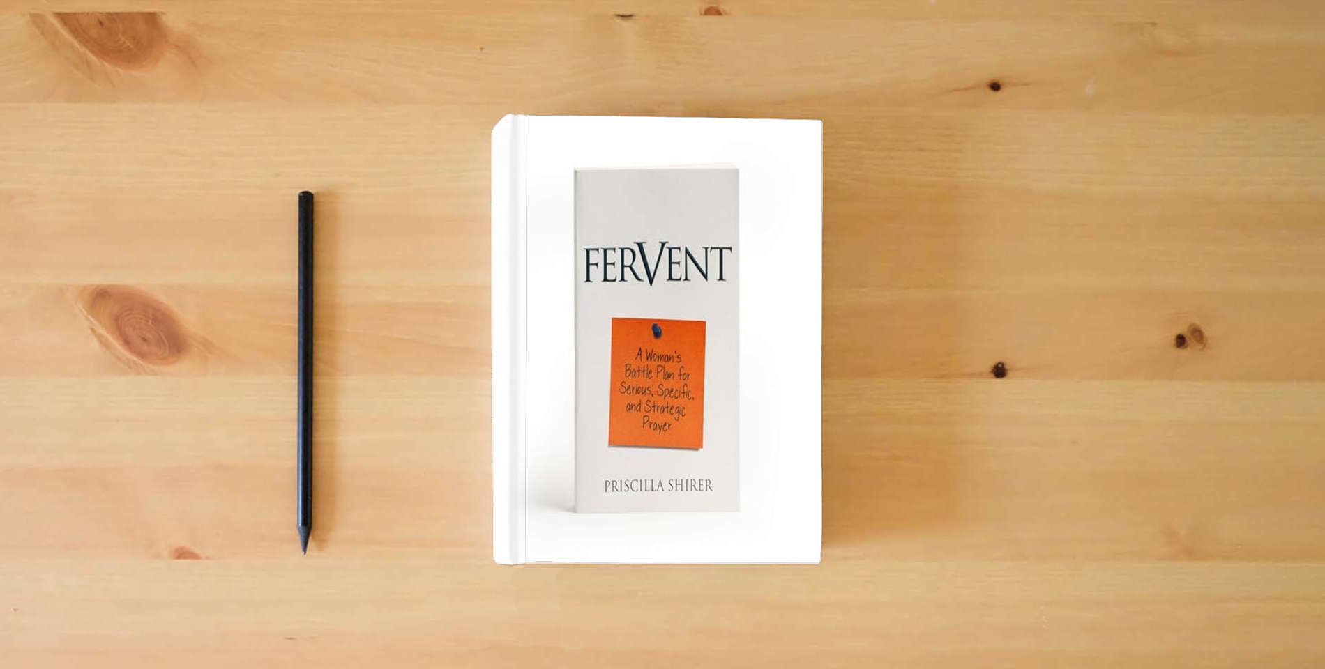 The book Fervent: A Woman's Battle Plan to Serious, Specific and Strategic Prayer is on the table