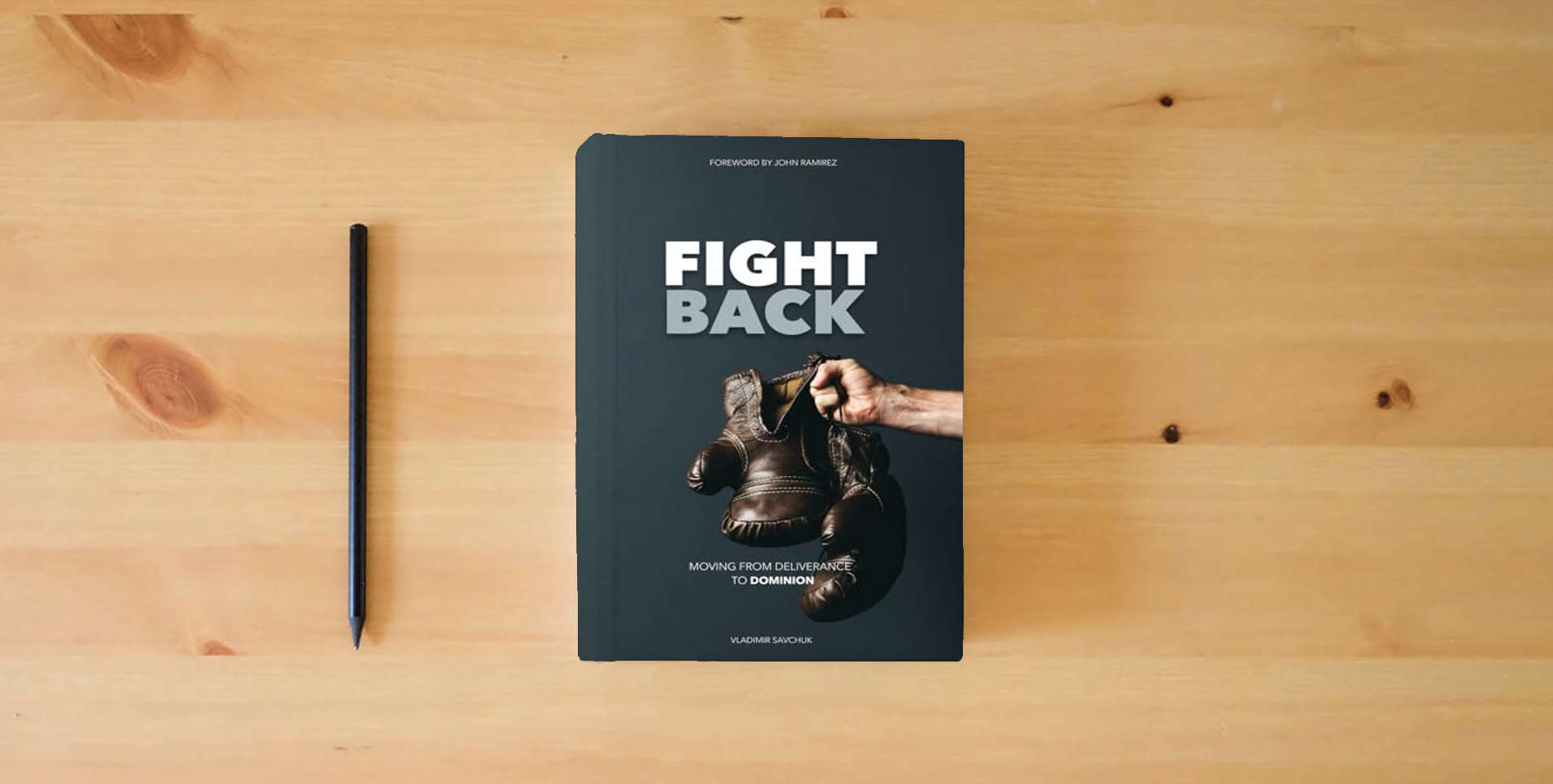 The book Fight Back: Moving from Deliverance to Dominion is on the table