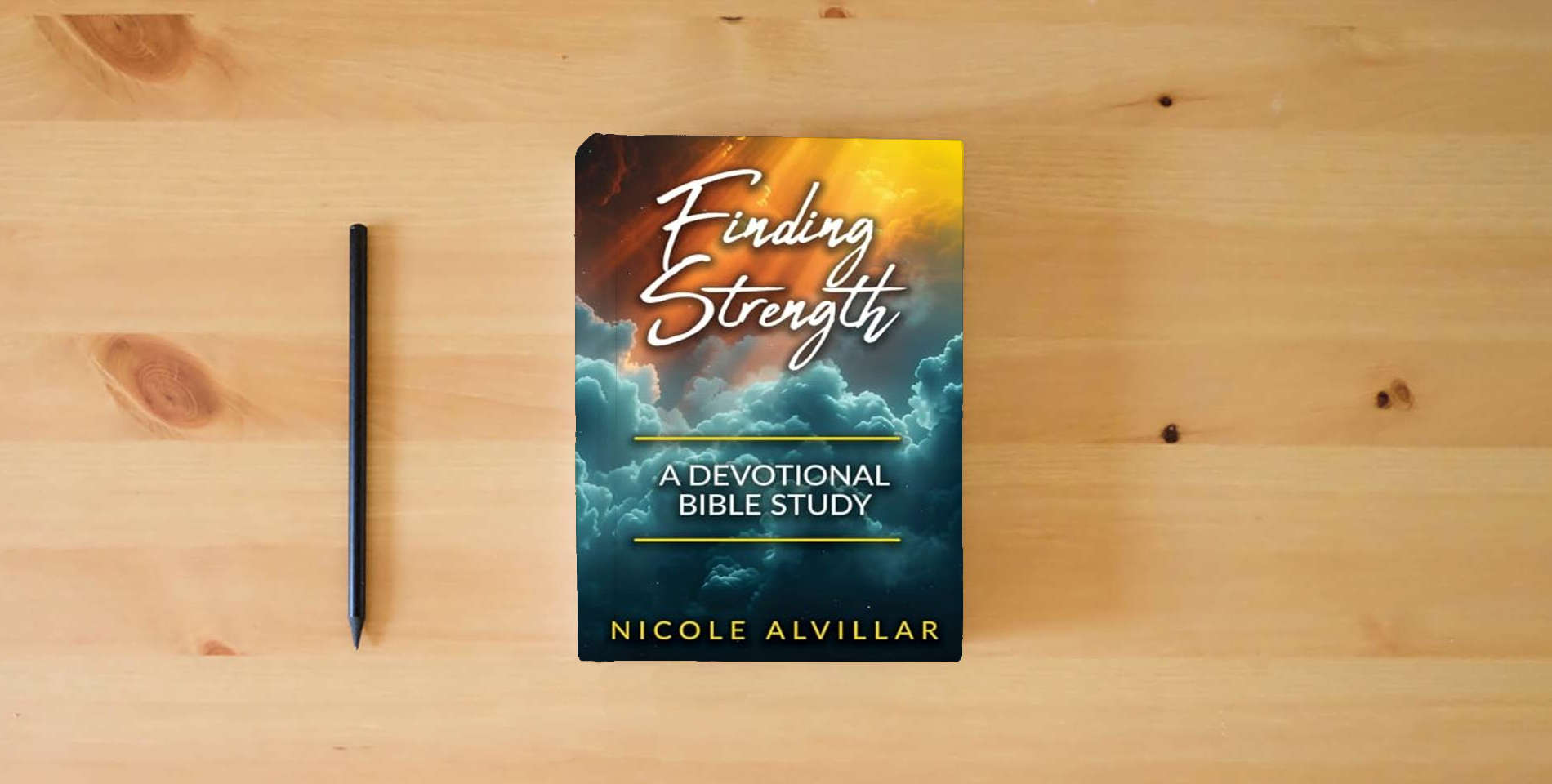 The book Finding Strength: A Devotional Bible Study is on the table