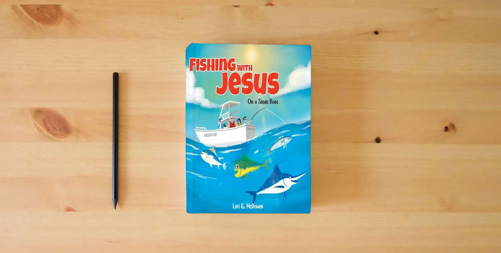 The book Fishing with Jesus on a Small Boat is on the table