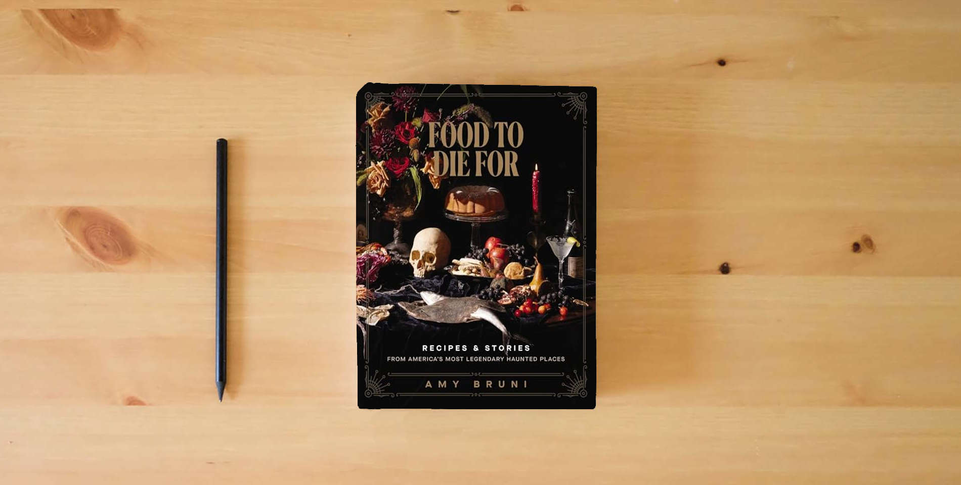 The book Food to Die For: Recipes and Stories from America's Most Legendary Haunted Places is on the table