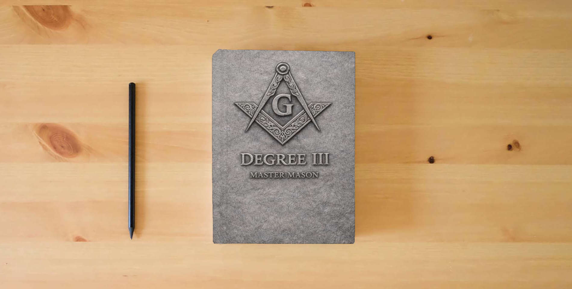 The book Freemasonry Degree III: The Secret Degrees of Freemasonry – Volume III The Master Mason: The Vault of the Mind (The Hidden Orders: 33 Degrees of Light Secret Society Collection) is on the table