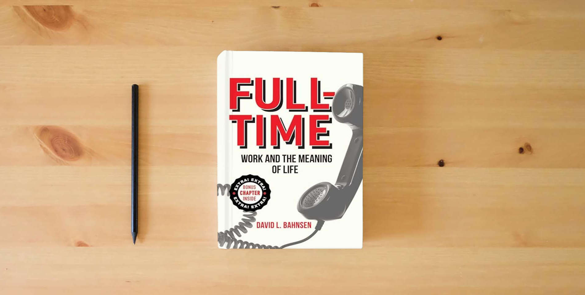 The book Full-Time: Work and the Meaning of Life is on the table