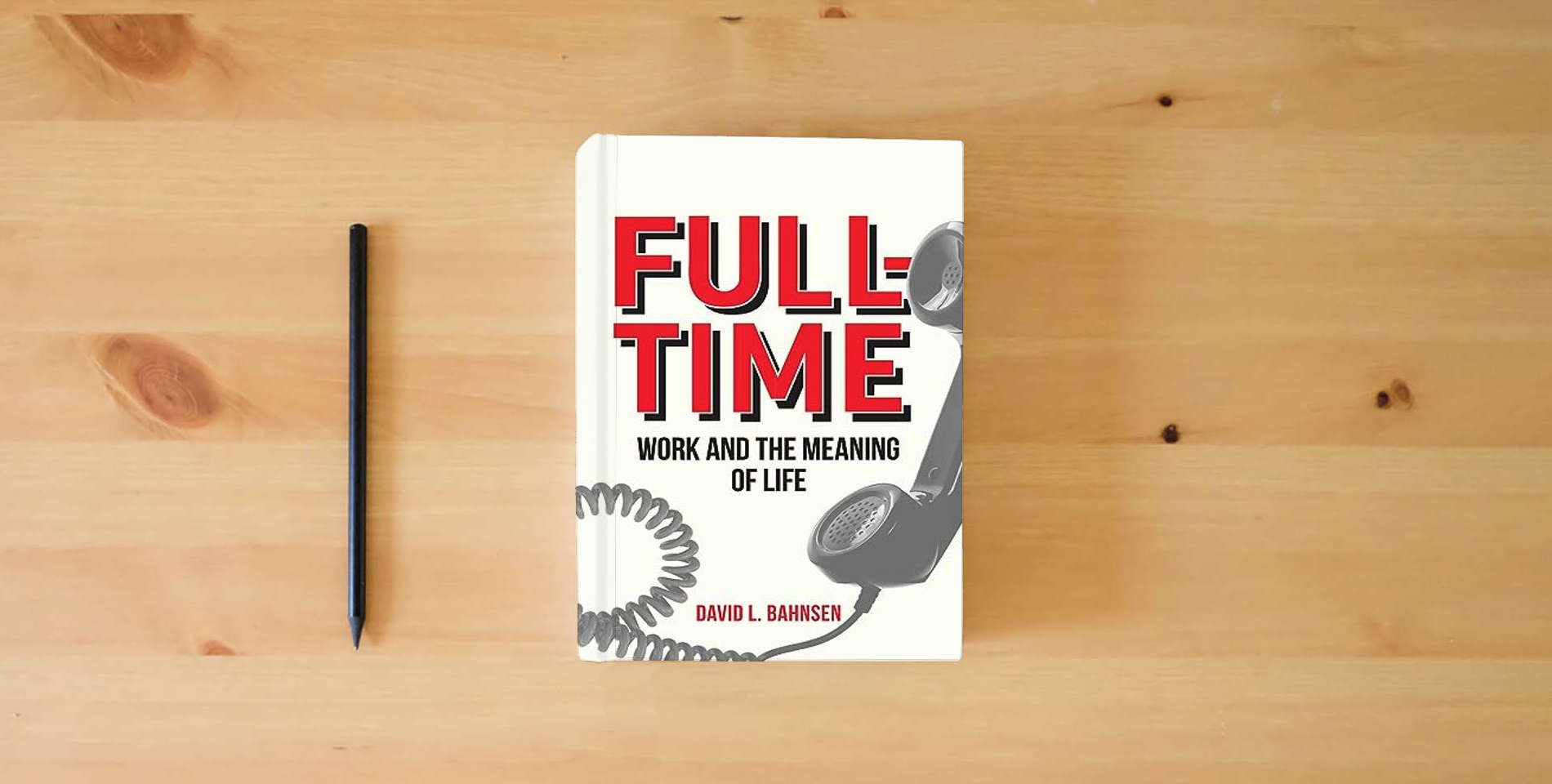 The book Full-Time: Work and the Meaning of Life is on the table