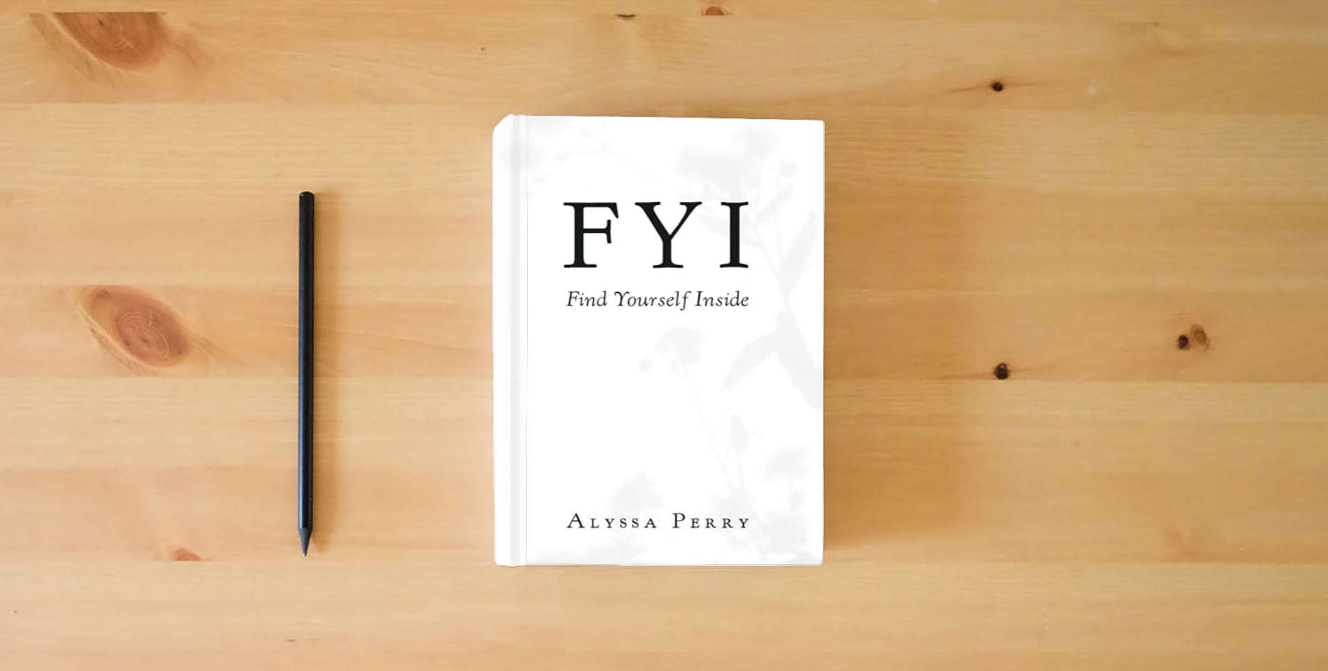 The book FYI: Find Yourself Inside is on the table