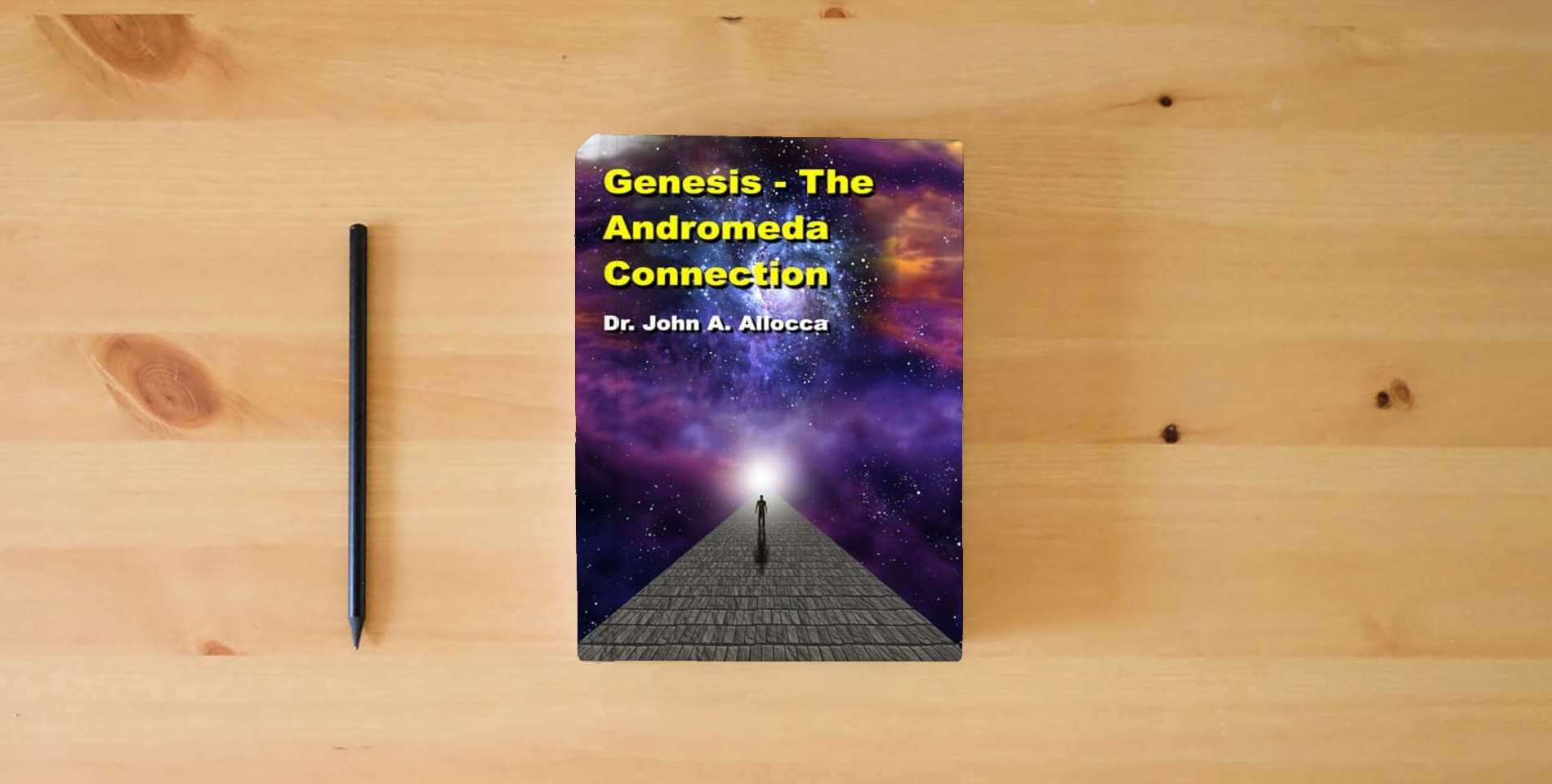 The book Genesis - The Andromeda Connection is on the table