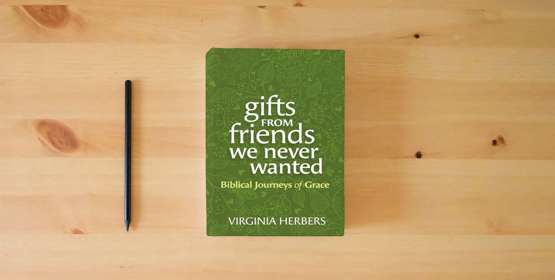 The book Gifts from Friends We Never Wanted: Biblical Journeys of Grace is on the table
