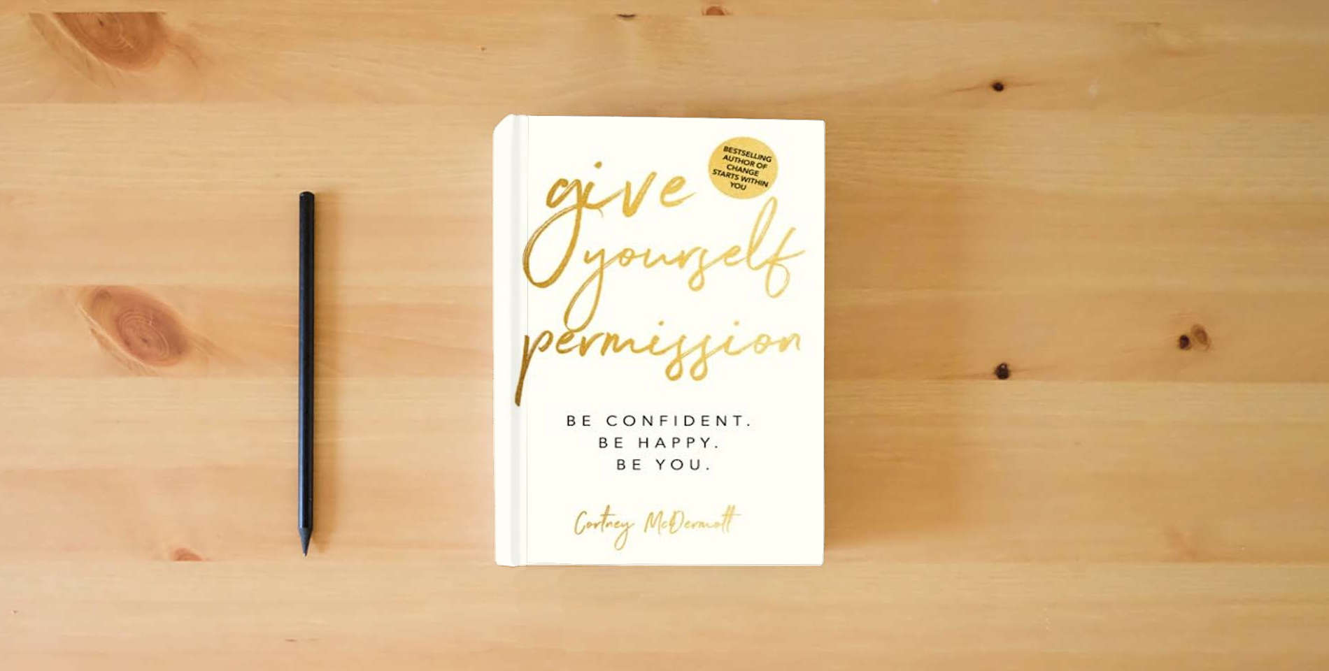 The book Give Yourself Permission: Be Confident Be Happy Be You: Master the Habits to Transform Your Life, Your Personal Development, Confidence, Self Improvement, Business Skills & Winning Leadership is on the table