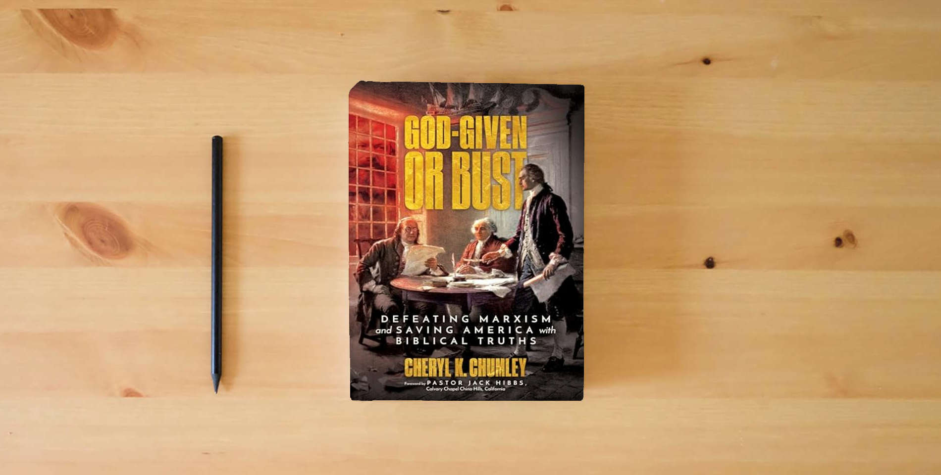 The book God-Given or Bust: Defeating Marxism and Saving America with Biblical Truths is on the table