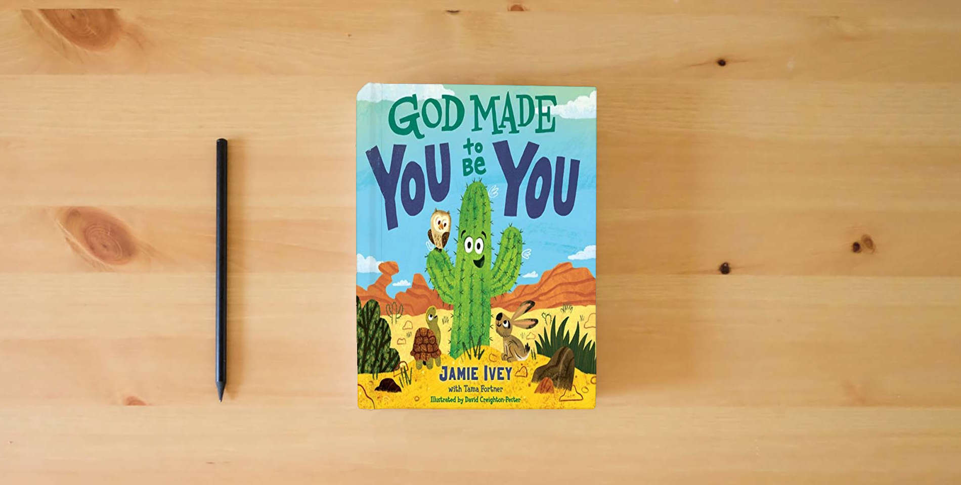 The book God Made You to Be You is on the table