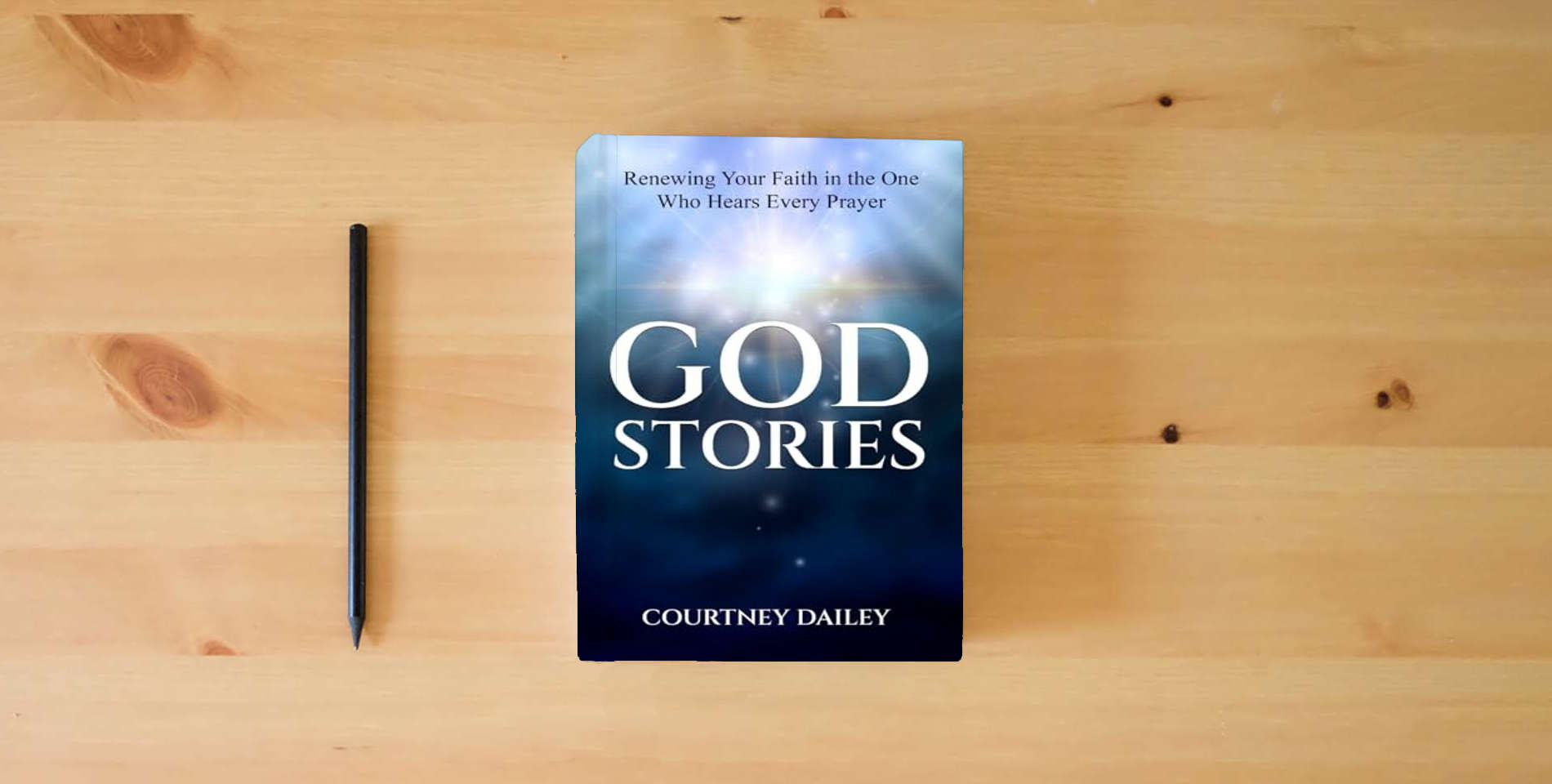 The book God Stories: Renewing Your Faith in the One Who Hears Every Prayer is on the table