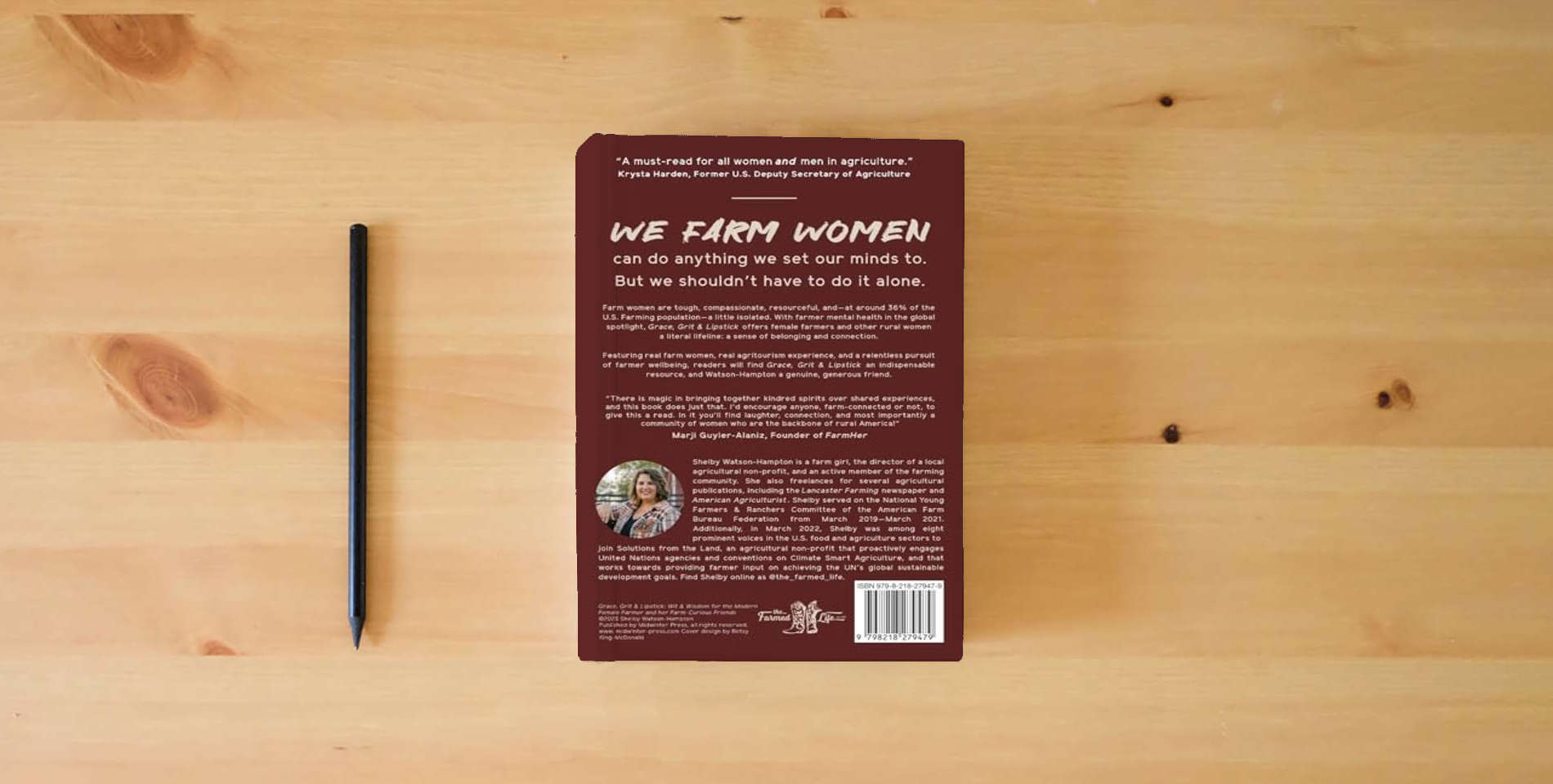 The book Grace, Grit & Lipstick: Wit & Wisdom for the Modern Female Farmer & her Farm-Curious Friends is on the table