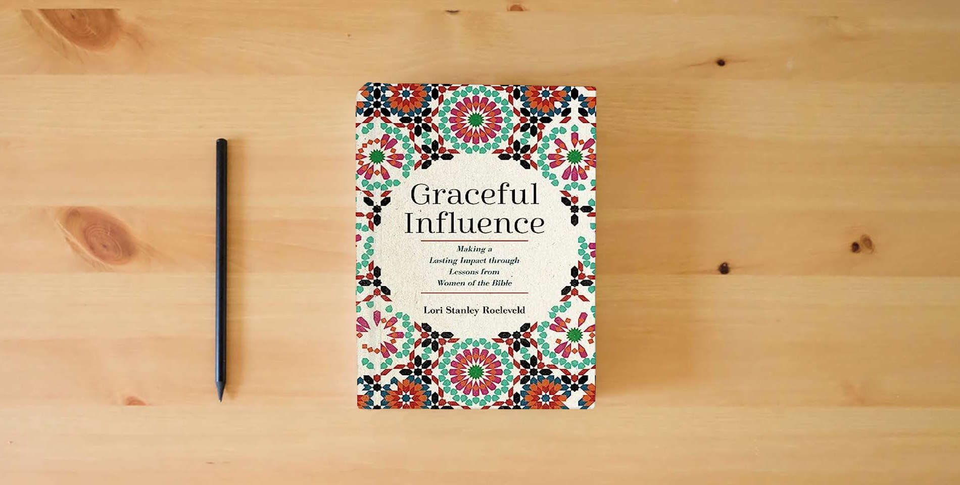 The book Graceful Influence: Making a Lasting Impact through Lessons from Women of the Bible is on the table