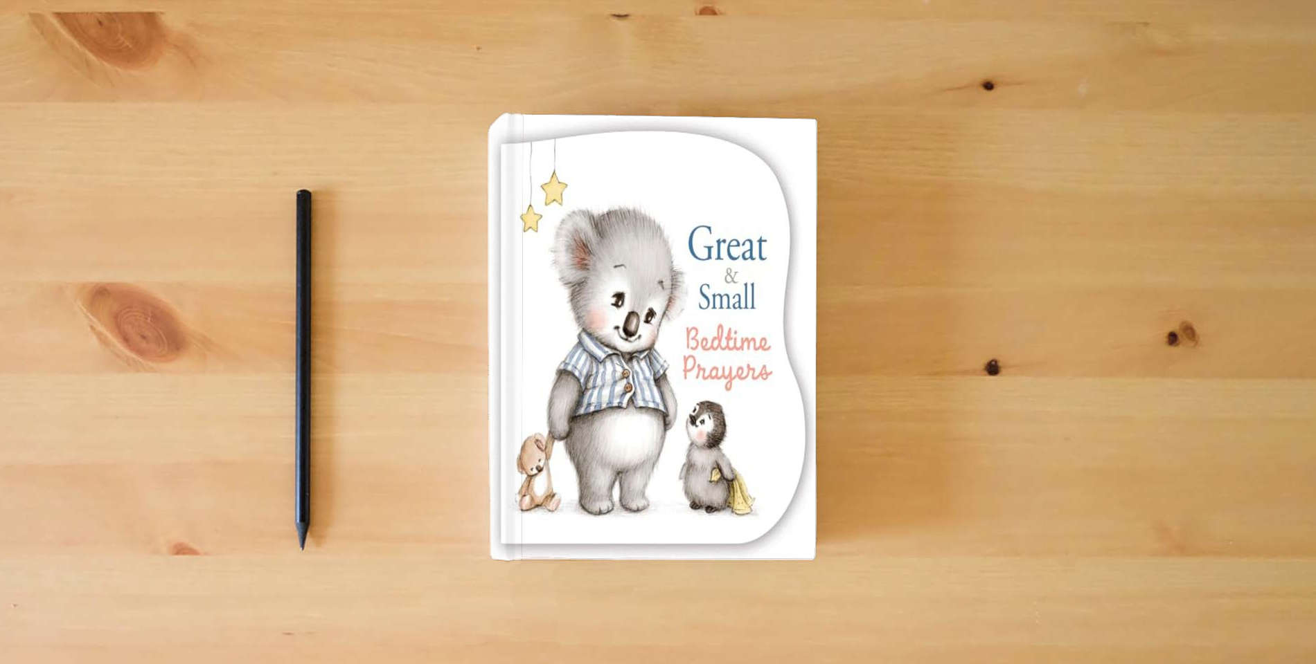 The book Great and Small Bedtime Prayers is on the table