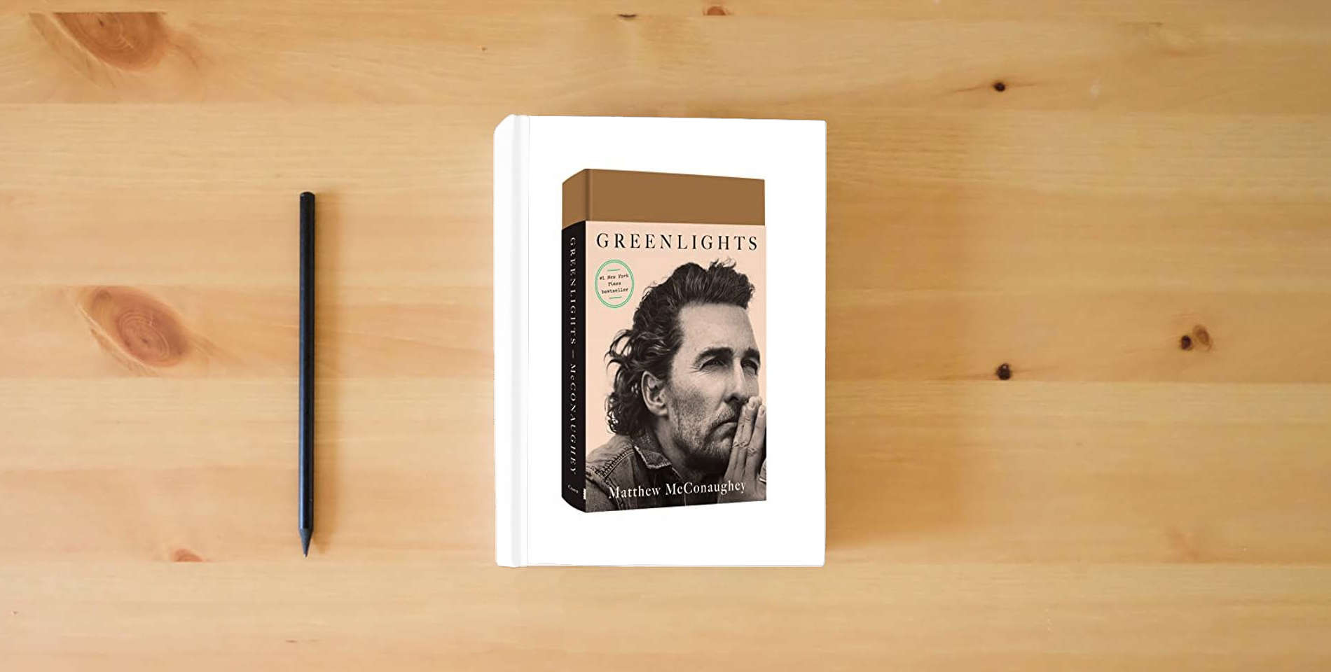 The book Greenlights is on the table