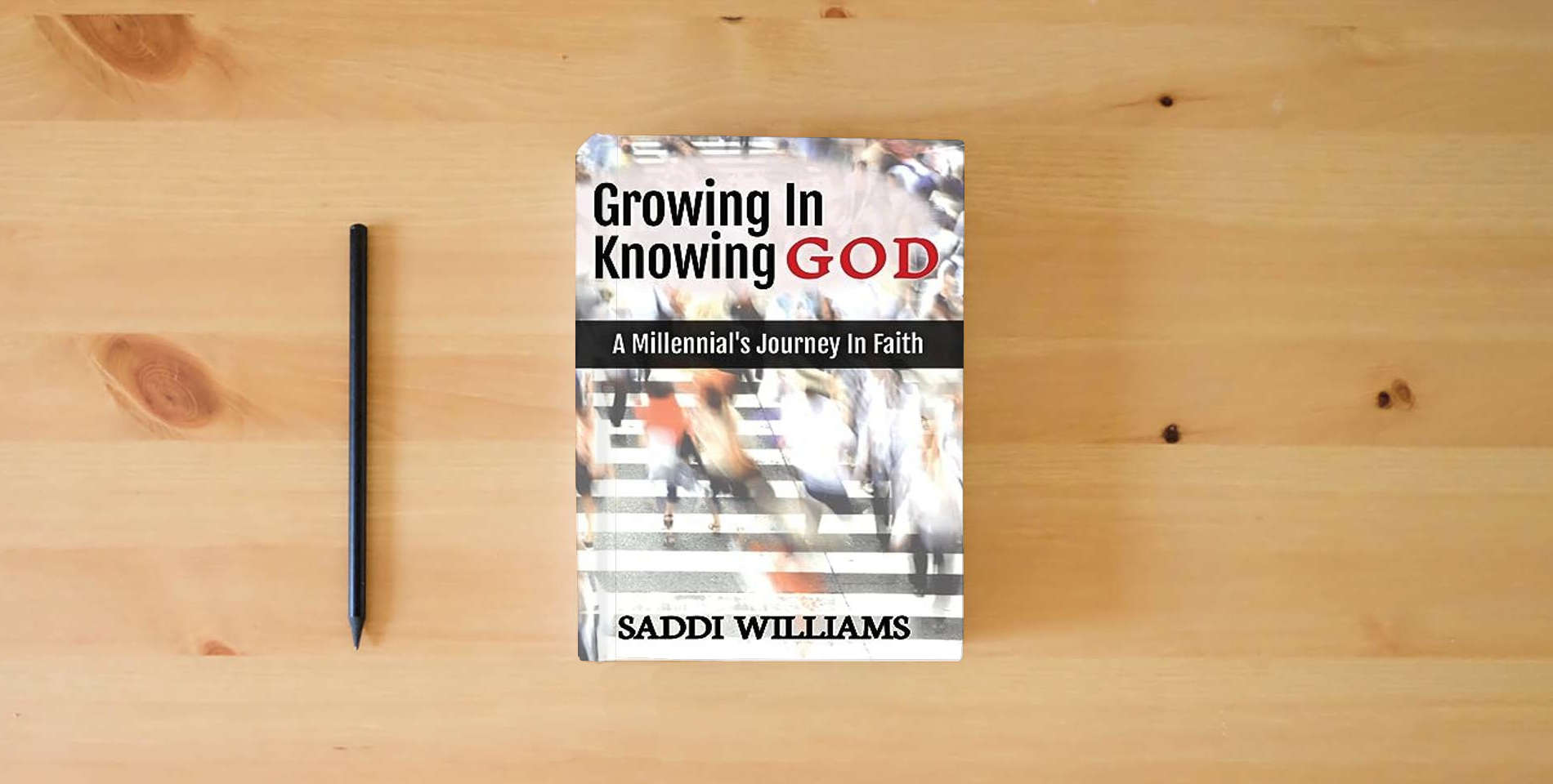 The book Growing In Knowing God: A Millennial's Journey In Faith is on the table