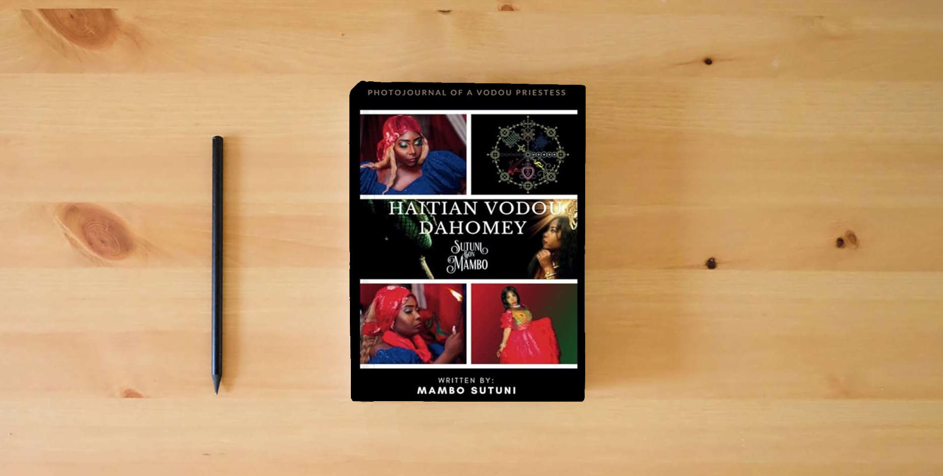 The book Haitian Vodou Dahomey: Volume 1 is on the table