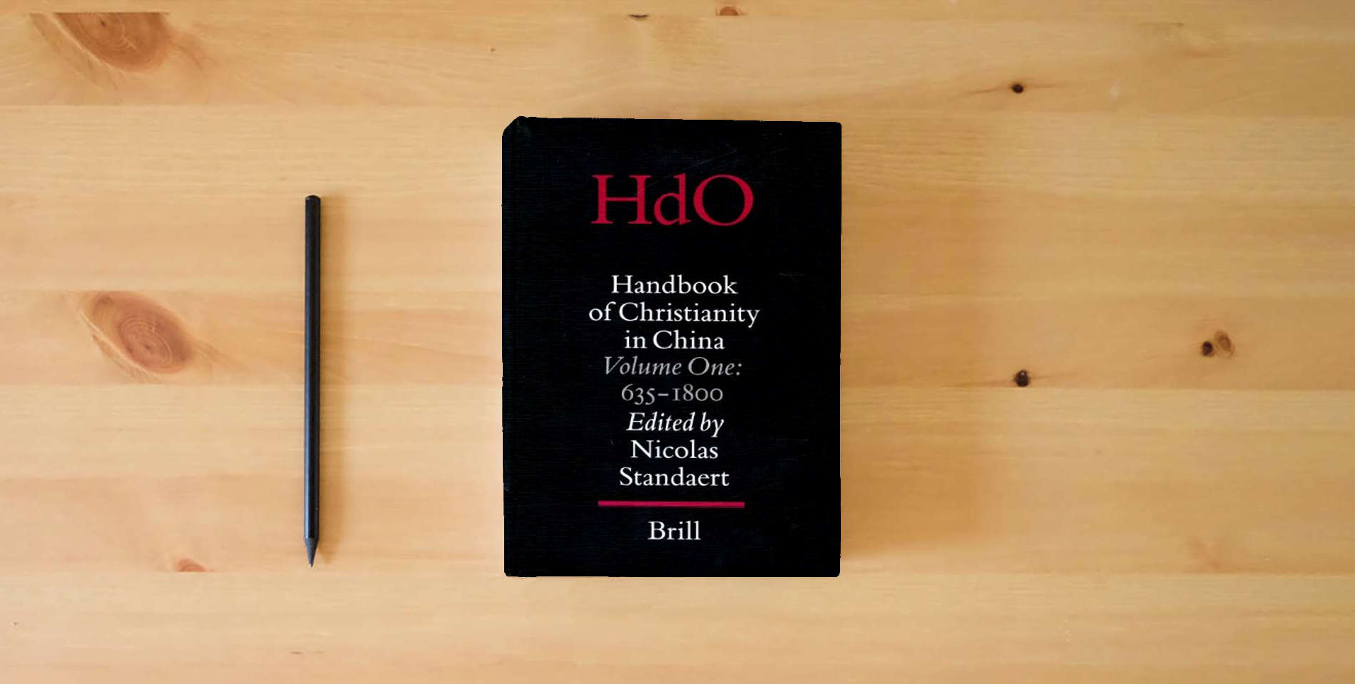 The book Handbook of Christianity in China: 635 - 1800 (Handbook of Oriental Studies/Handbuch Der Orientalistik - Part 4: China, 15) is on the table