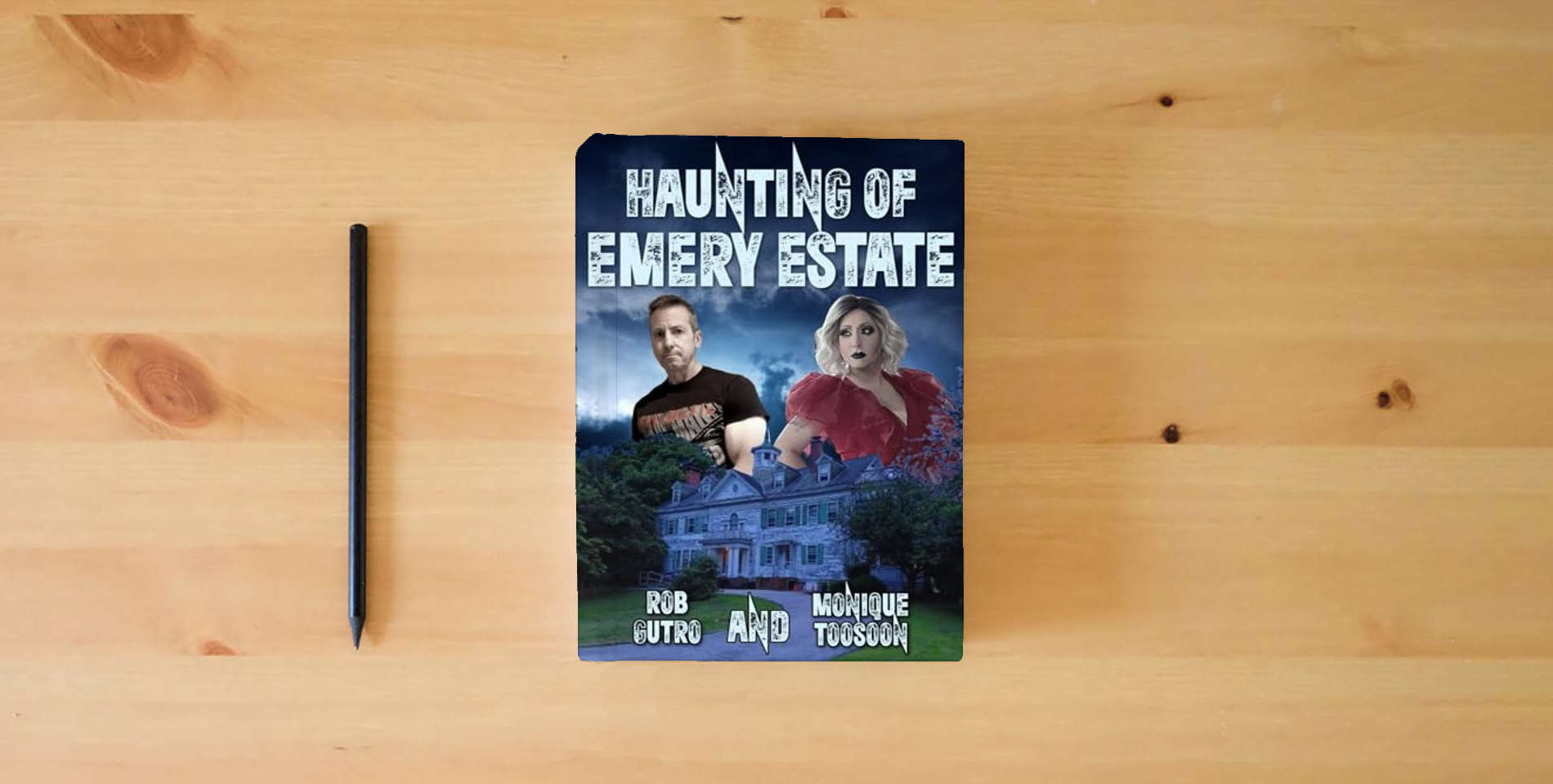 The book Haunting of Emery Estate is on the table