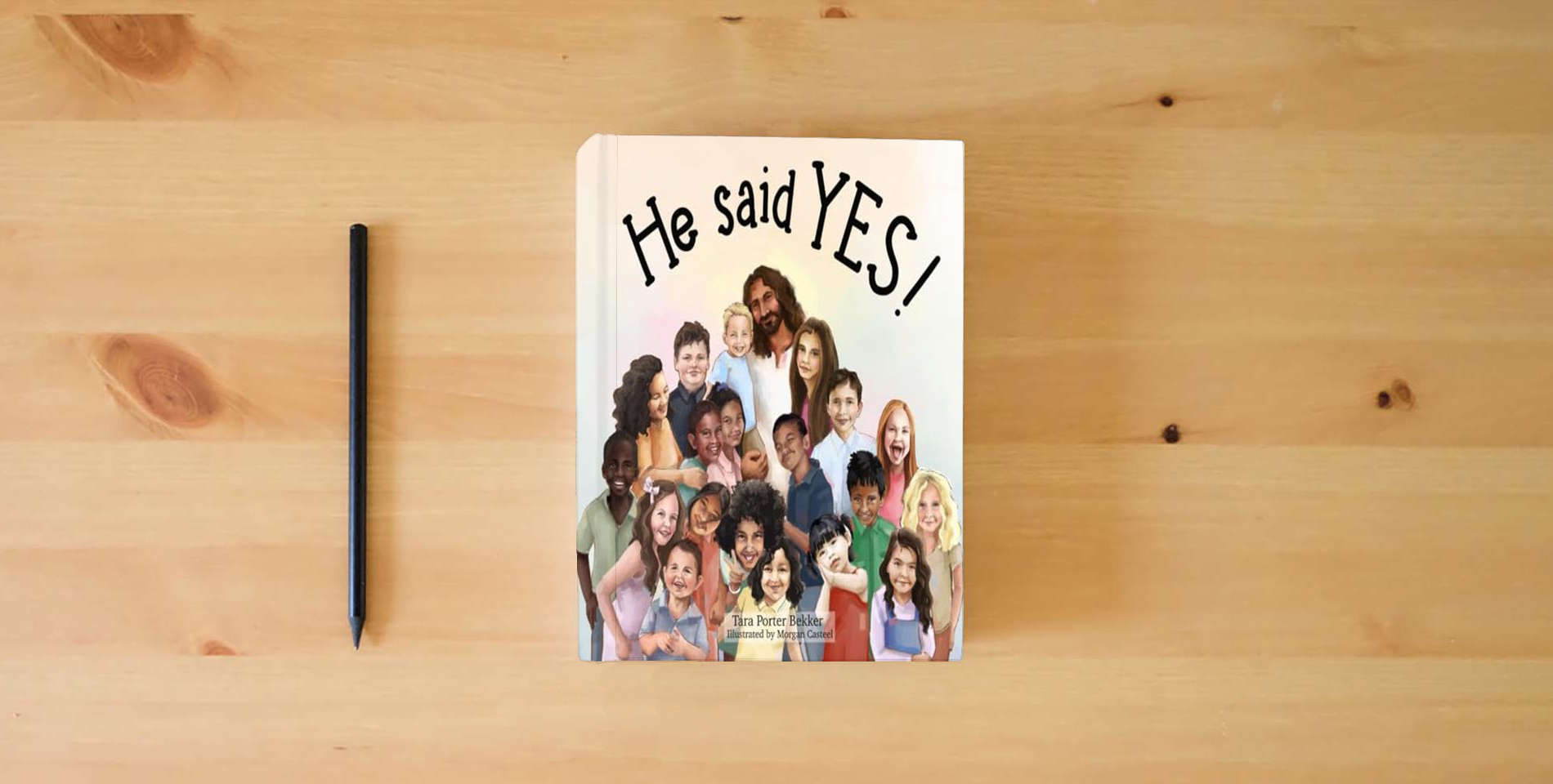 The book He said YES! is on the table